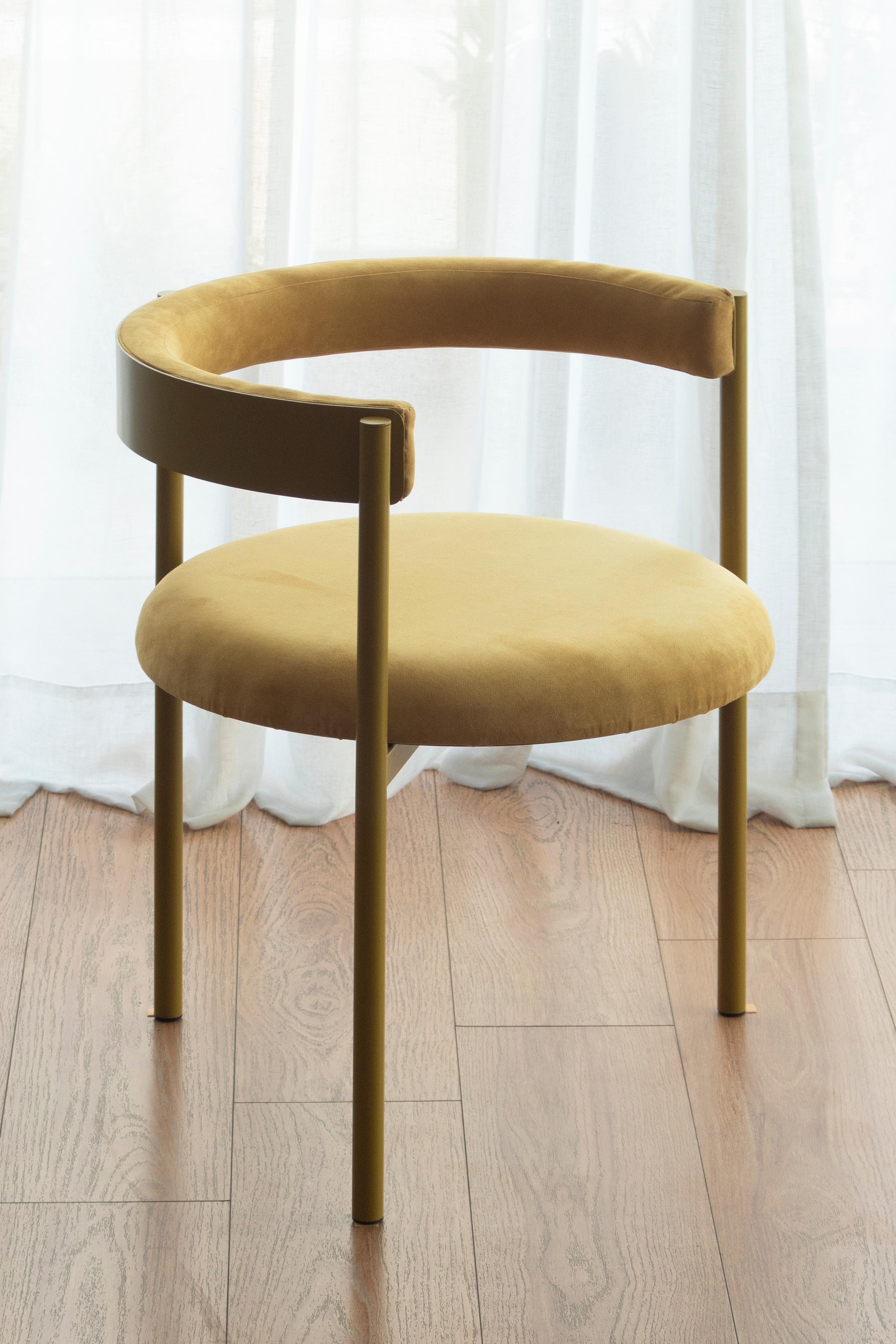 Aro Chair, Yellow by Ries
Dimensions: W60 x D60 x H67,5 cm 
Materials: Round Steel Tube, High-Density Foam, and Velvet Upholstery

Also Available: Merlot, Black, Mika, Oceano, Pink and Dark Blue, please contact us.

Ries is a design studio