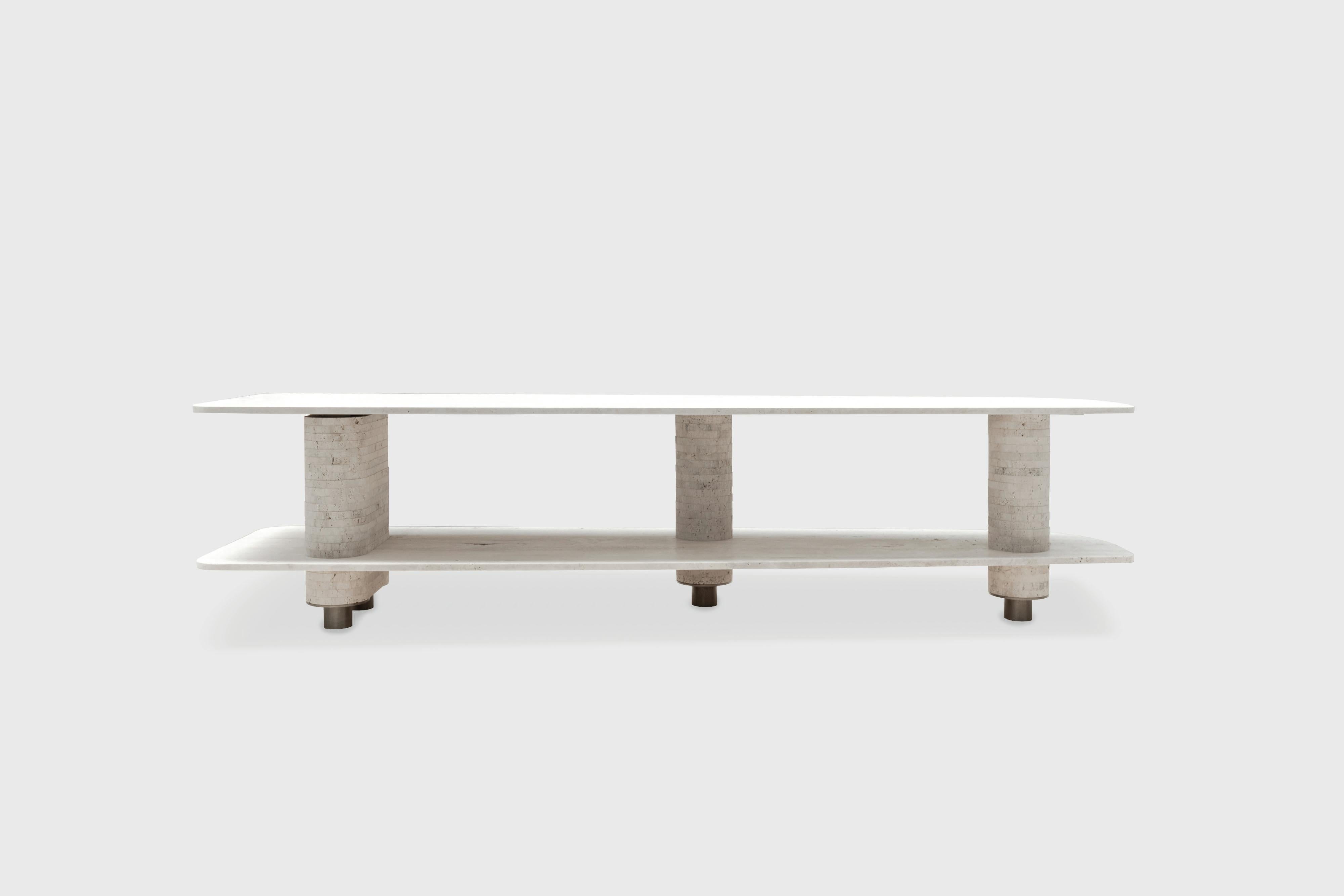 Aro console table by Atra Design
Dimensions: D 250 x W 60 x H 45 cm
Materials: Silk Georgette marble top and sculptural base of taj mahal stone rings with brass details.
Also available in different stones: Calacatta Viola, Rhino Quartz, Calacata