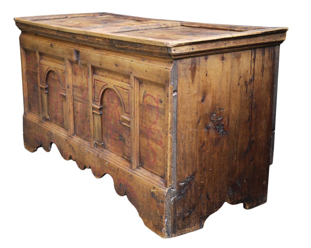 Measures: H.90cm, W. 165cm, D. 72cm
H. 35.4 in, W.65 in, D. 28.3 in

Tyrolean chest, in arolla wood and fir. On the front two arched architectural elements enclose stylized red decorations. Lowering richly carved. Tyrol (Northern Italy) early