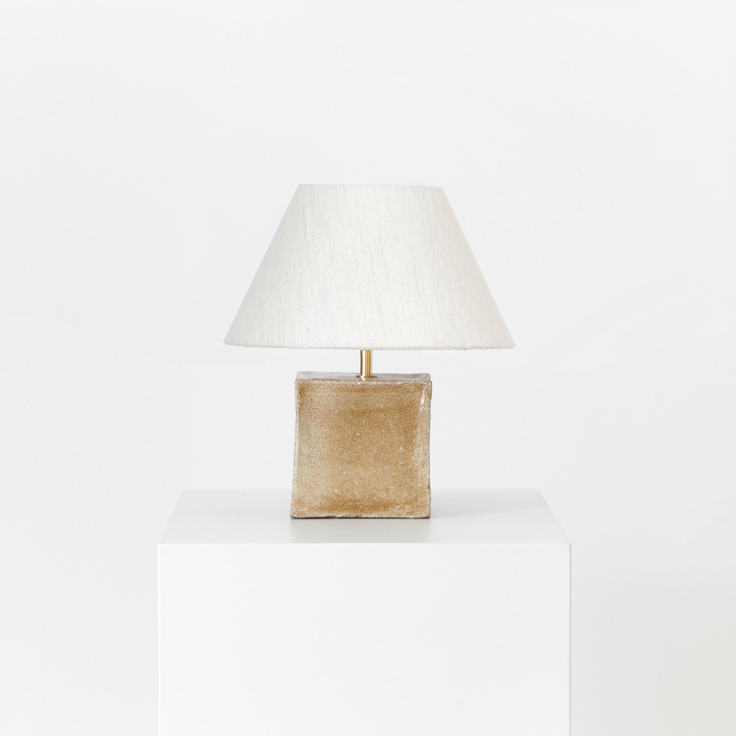 AROUCA TABLE LIGHT, designed in 2024.

Artisanal table light with a cube ceramic base, made in Project 213A's own ceramic workshop. Each piece is unique due to its handmade nature, shapes and shades of the ceramic base can vary slightly. 

Bespoke