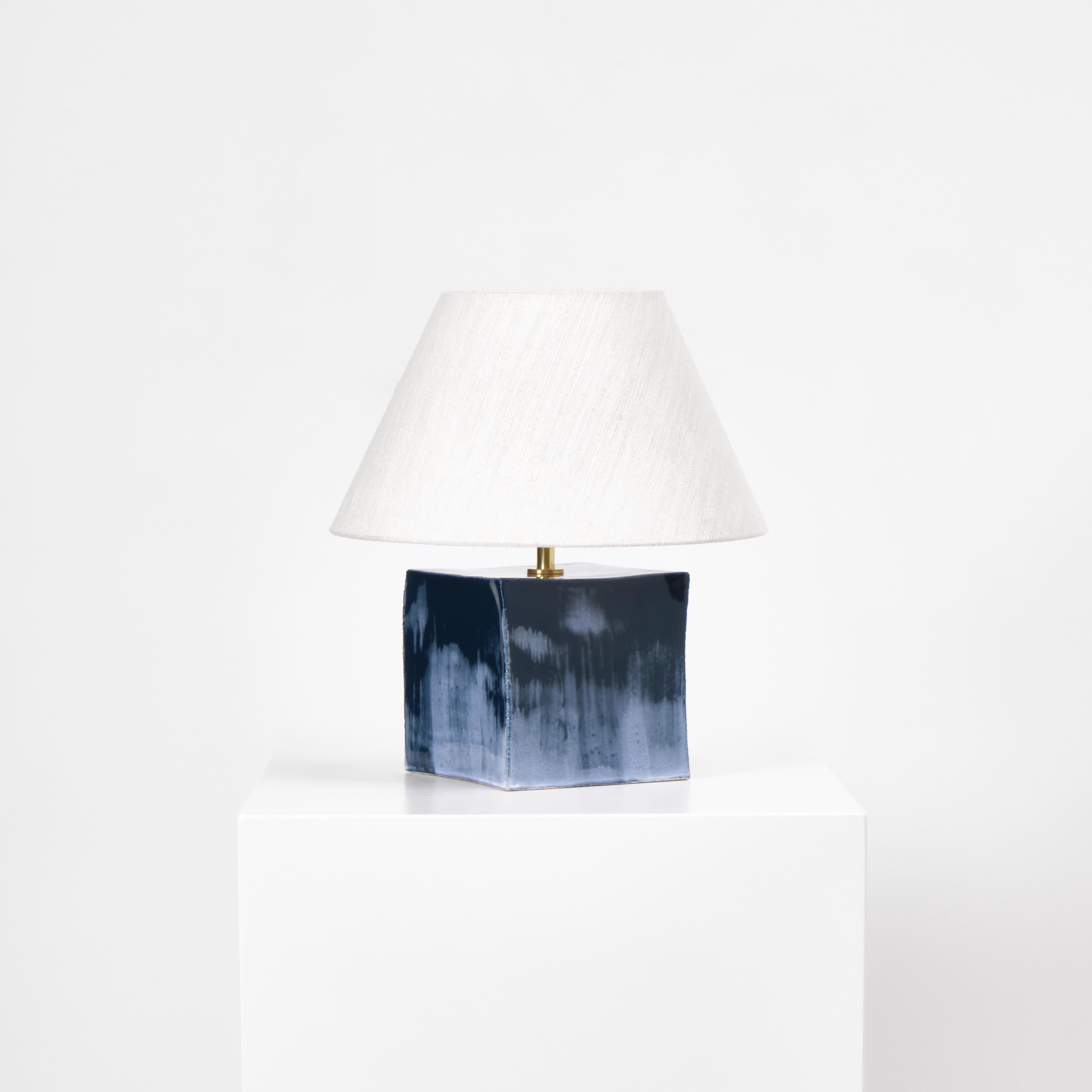 AROUCA TABLE LIGHT, designed in 2024.

Artisanal table light with a cube ceramic base, made in Project 213A's own ceramic workshop. Each piece is unique due to its handmade nature, shapes and shades of the ceramic base can vary slightly. 

Bespoke