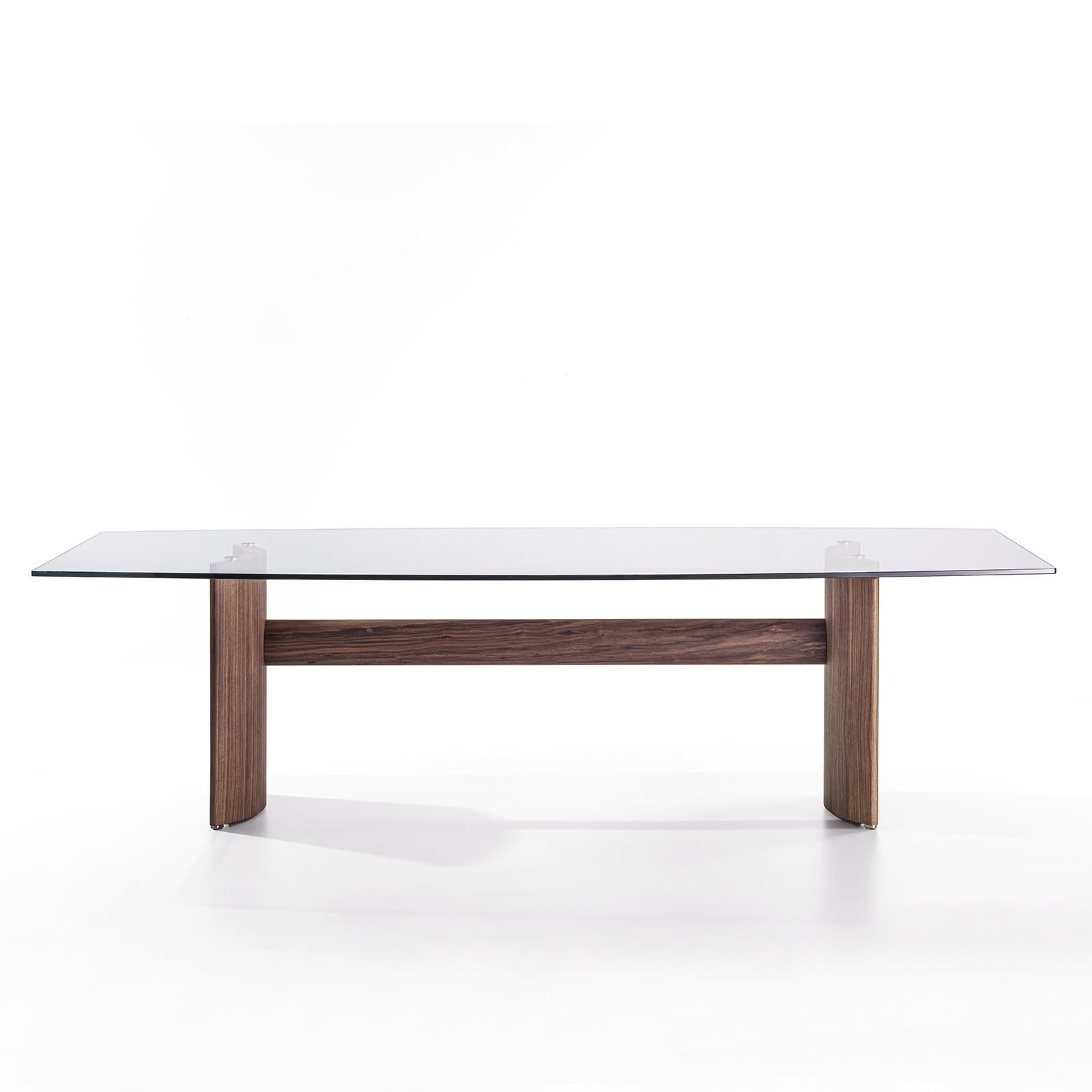 Dining table around Walnut with 2 curved solid 
walnut bases and with curved shaped clear glass top.
Available on request in:
L130 to 140cm x D 110 to 120 cm x H 72cm, price: 12500,00€
L140 to 160cmxD110 to 120cmxH72cm, price: 12900,00€
L160 to
