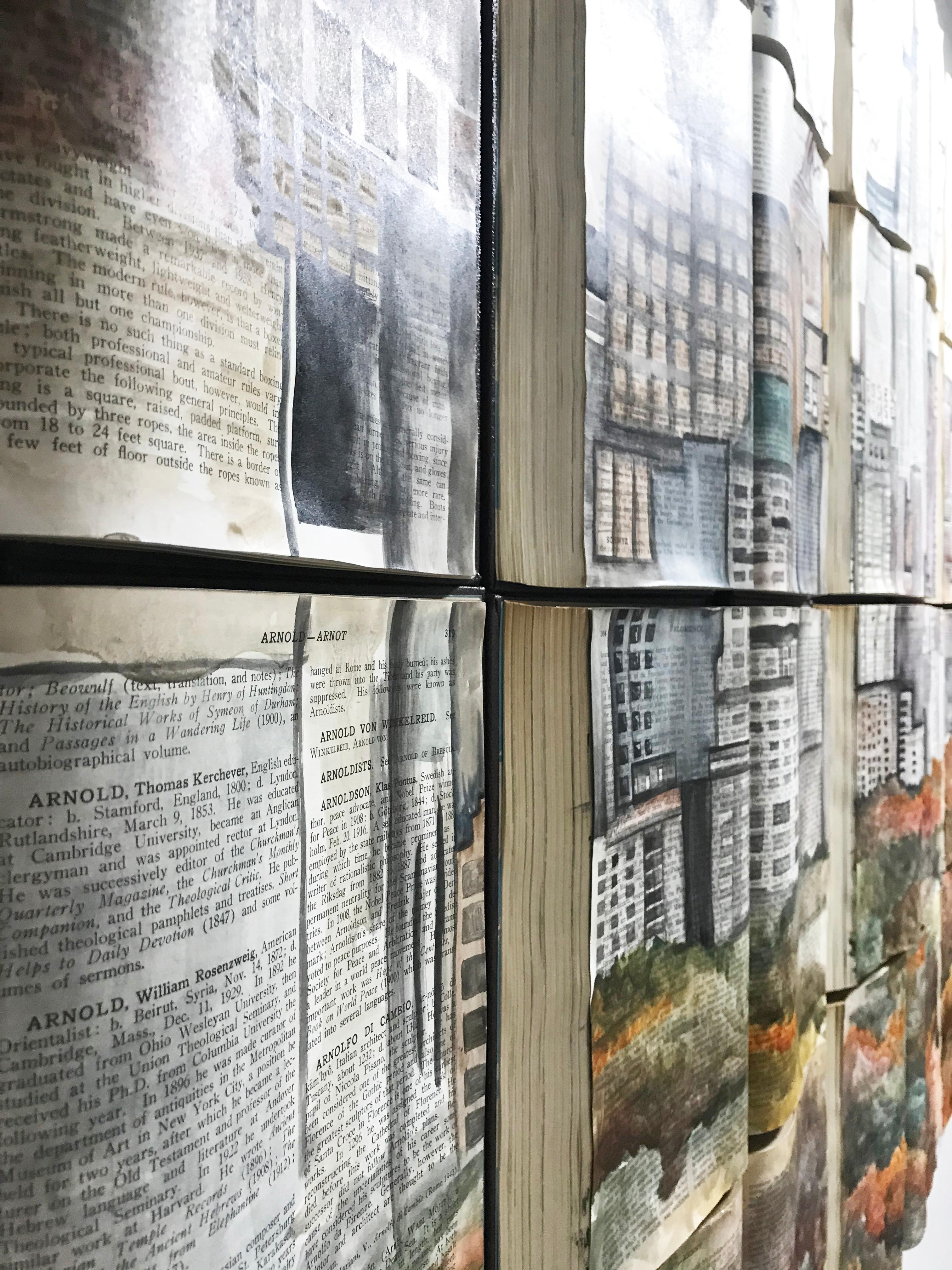 The two artists and industrial designers, María Amparo Arozarena and Elena De La Fuente focus their art on creating 3d textures using diverse materials. This unique book canvass was made with abandonded books they found at an antique place in the