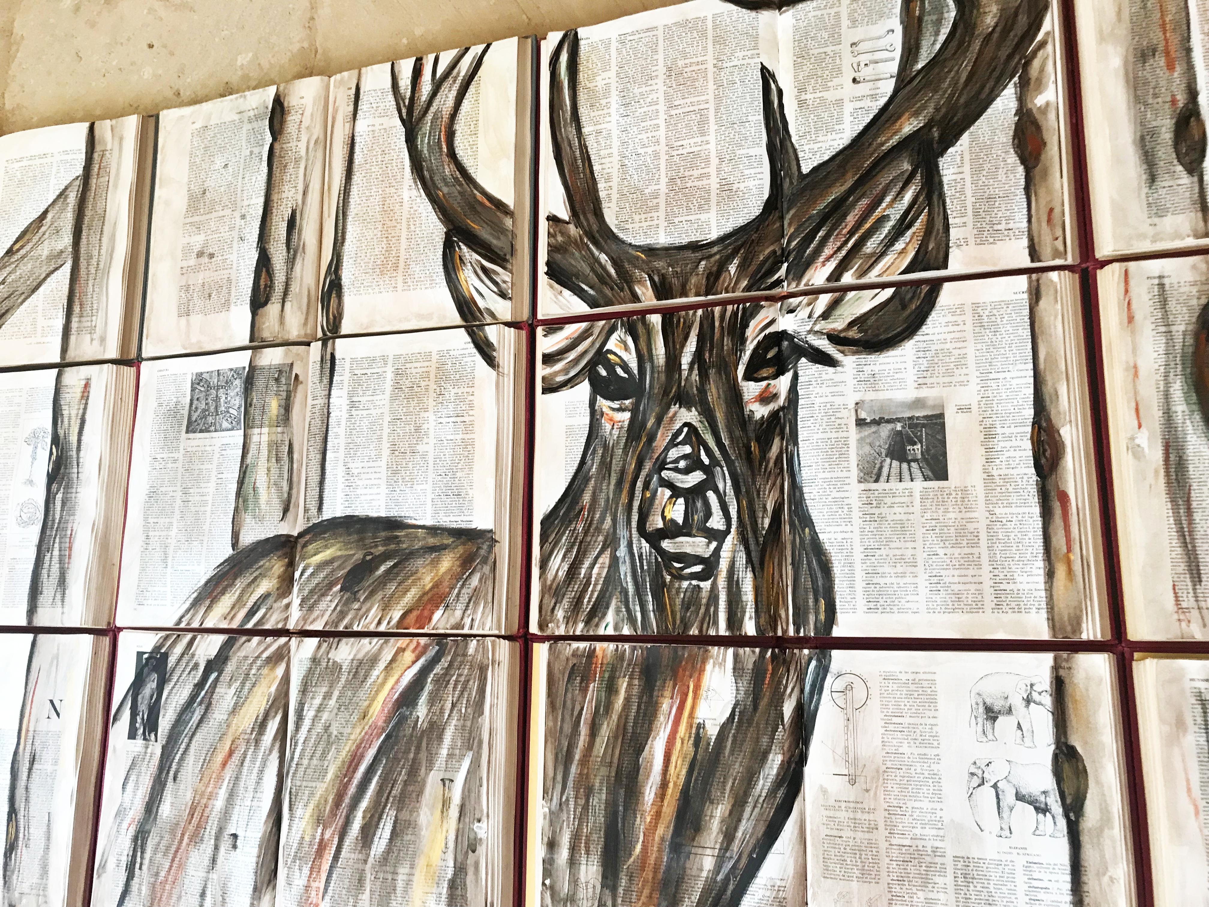 This unique piece was painted upon a book canvass. The artist gives these abandoned books a new life and purpose. The brown, copper and orange colors fill the space with a rustic feeling. They are easy to install for they have metal fixings on the