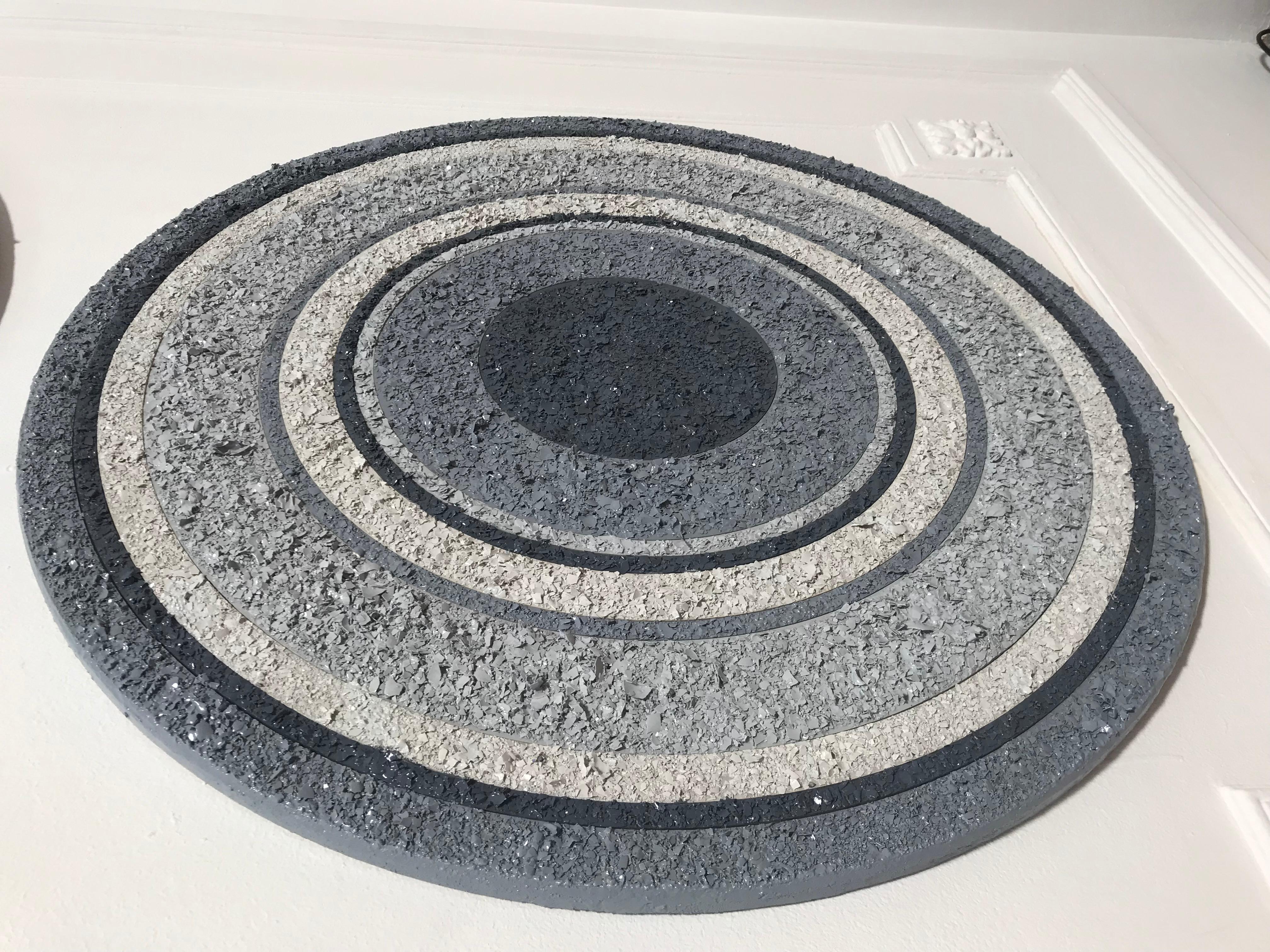 The two artists were inspired by water and sound frequencies and decided to represent this feeling with a recycled material. The cycles in the circles transport us to the movement in life. Our fragility as human beings and our relationship with