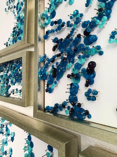 Elegant Water Splash Collage made with Buttons and Nails