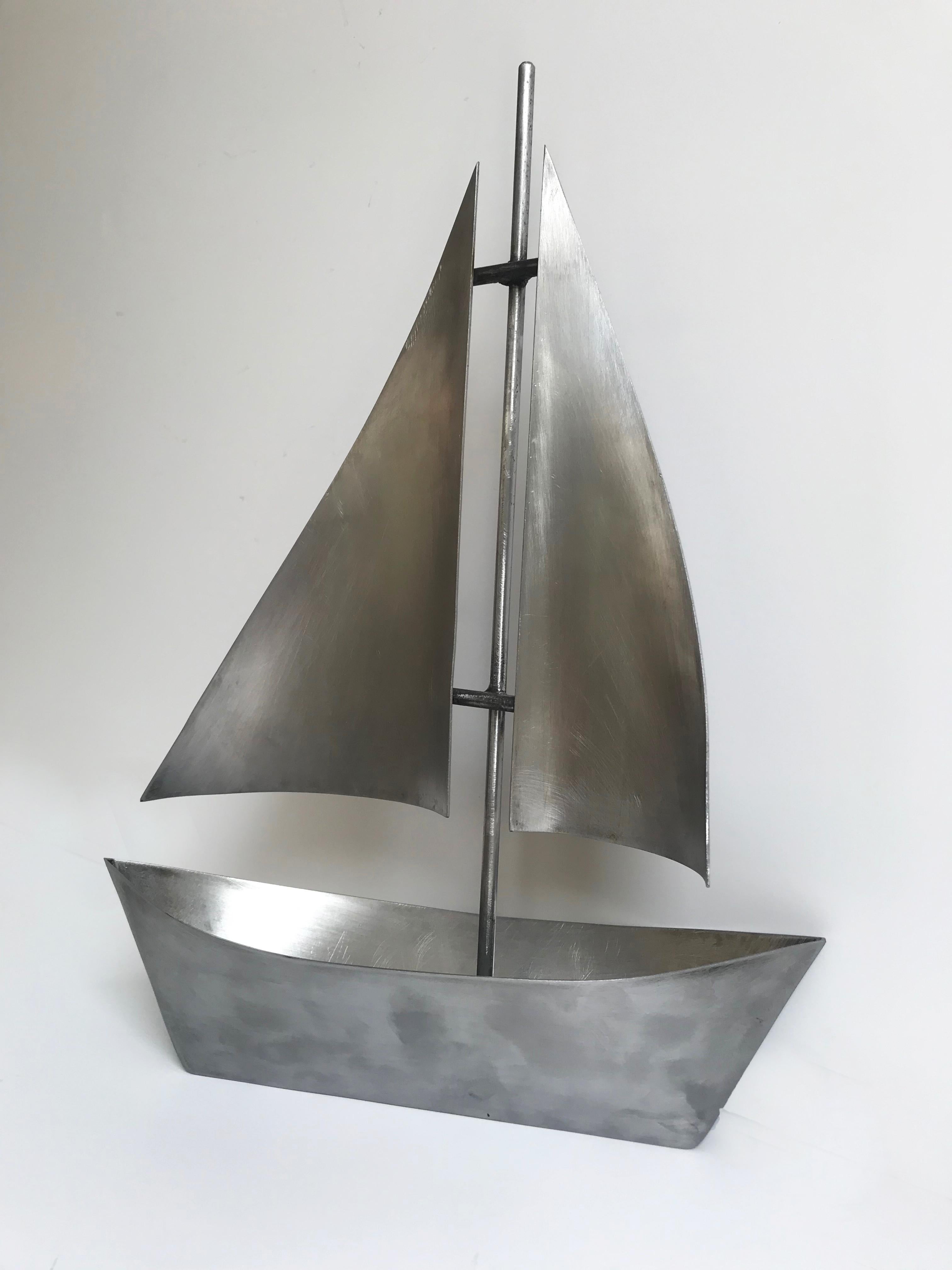 metal boat sculpture
