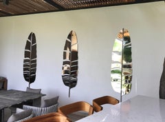 Trois élégantes sculptures de feuilles en finition chromée pour murs