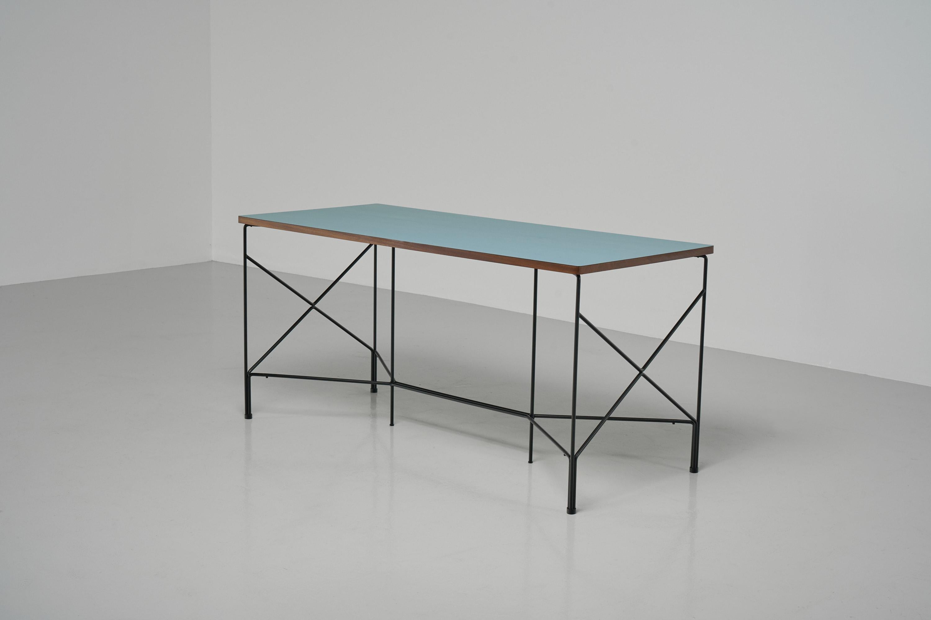 Rare and collectible desk designed by A.R.P. (Atelier de Recherches Plastiques) and manufactured by Minvielle, France 1955. Studio A.R.P. was an association between three talented designers; Pierre Guariche, Joseph-André Motte and Michel Mortier.