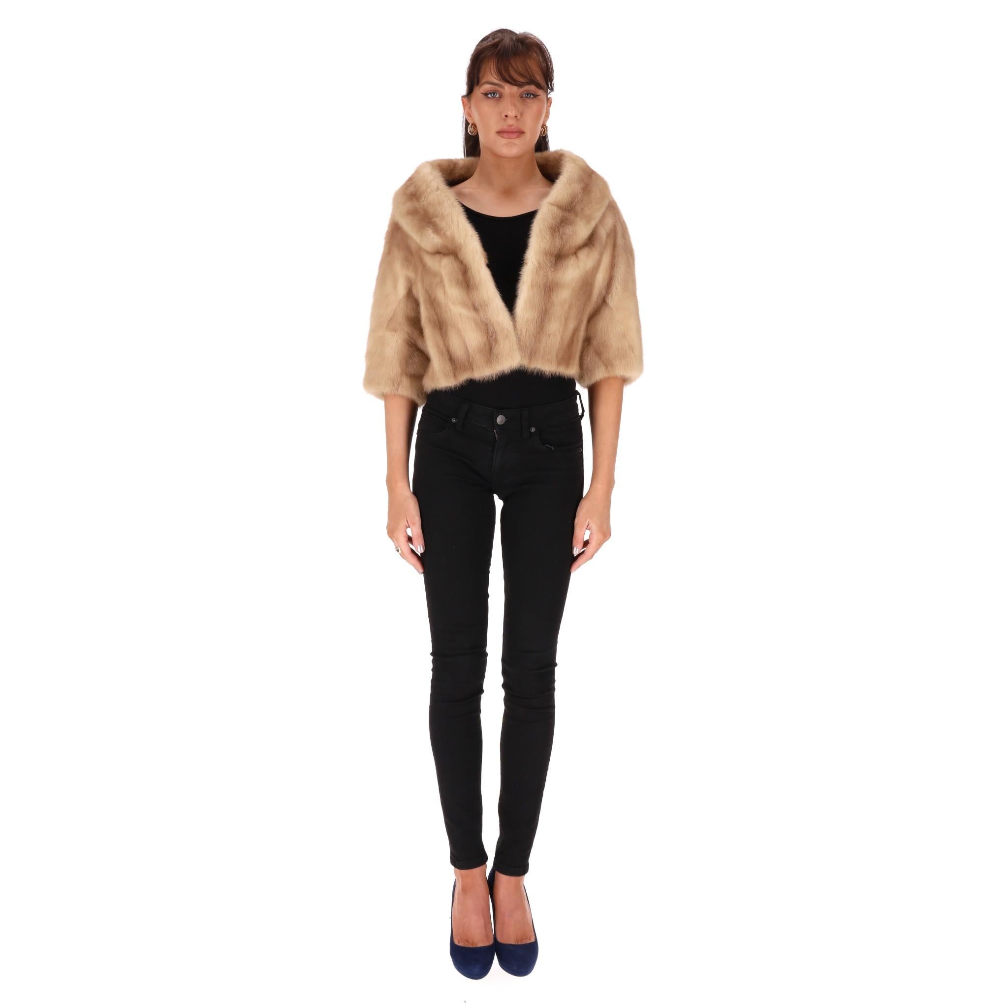 Arpad Mink Fur Cropped Jacket

Cropped/bolero jacket crafted from luxurious blonde mink fur.

Featuring elegant collar, three-quarter sleeves and hook centre closure.

Rrp Approx. £3,000

Size – XS (Label missing but corresponds)

Condition – Very