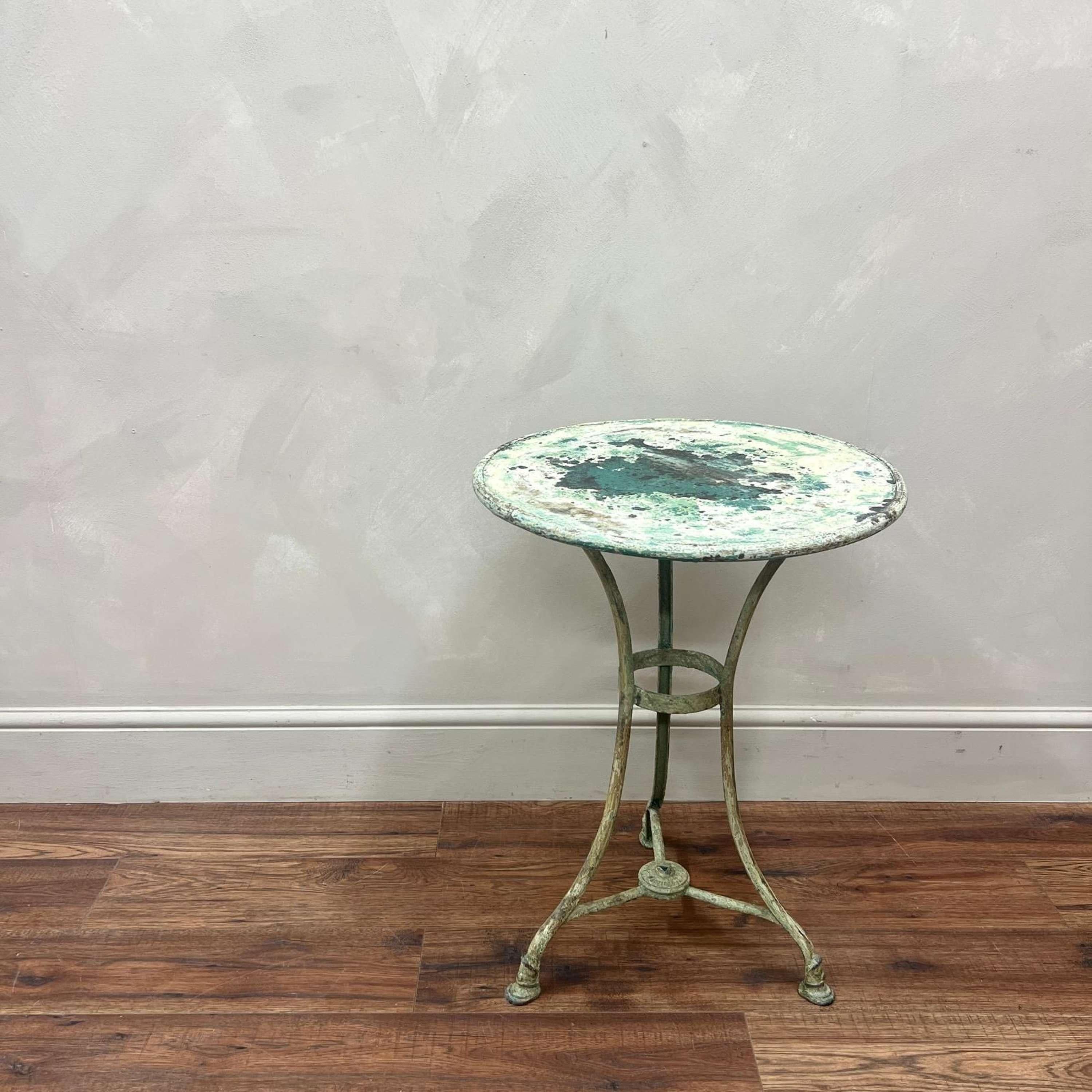 Arras garden bistro table, with layers of original scraped paint.
Hoof feet and Arras stamp to the base.

France, circa 1910.

Height - 68cm (26.75