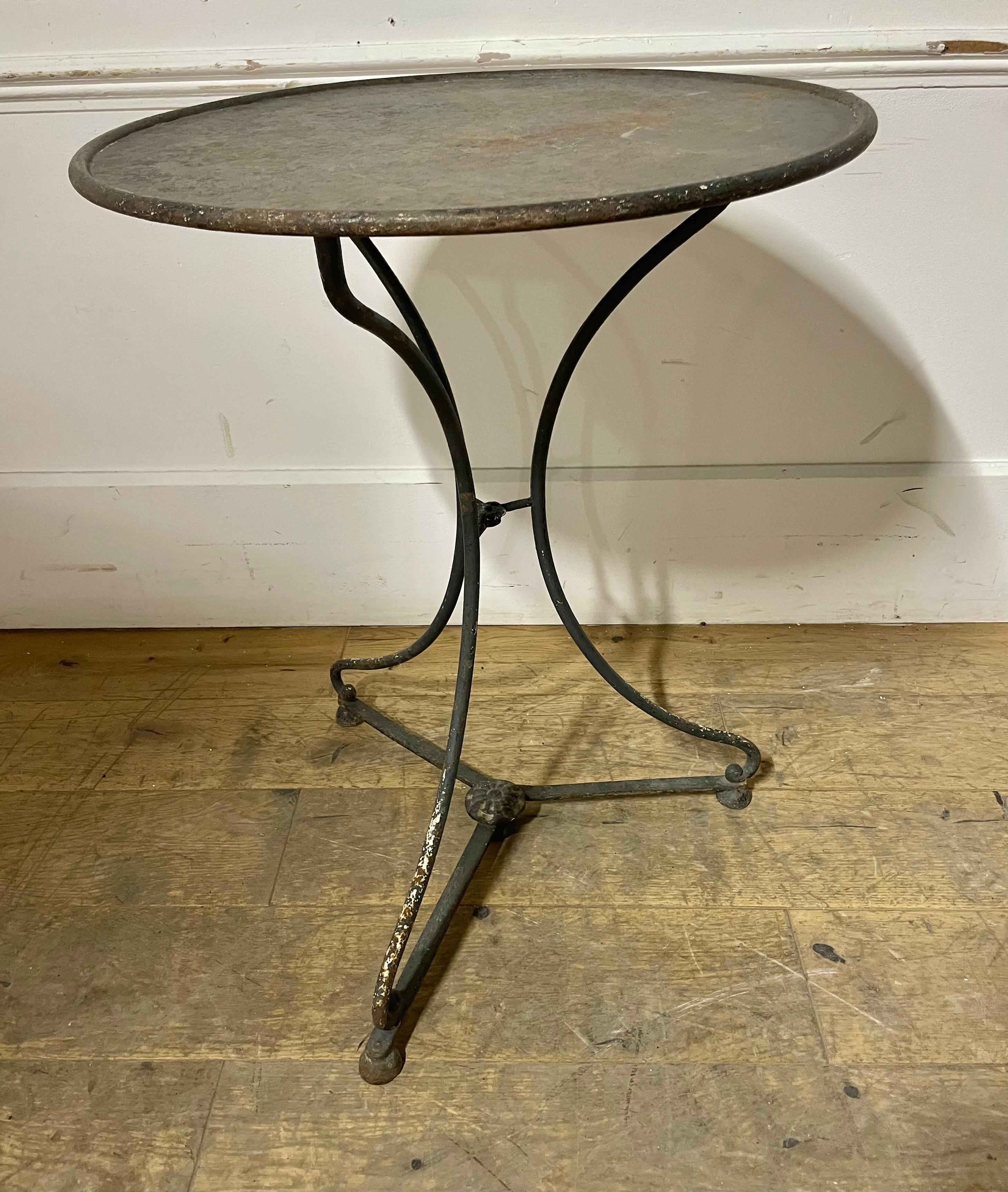Stunning example of a mid 19th century cast iron garden table 

This is a highly unusual piece as it can fold flat for transportation / campaign piece ?

French circa 1860’s in untouched original condition , the top is thick cast iron , nice little
