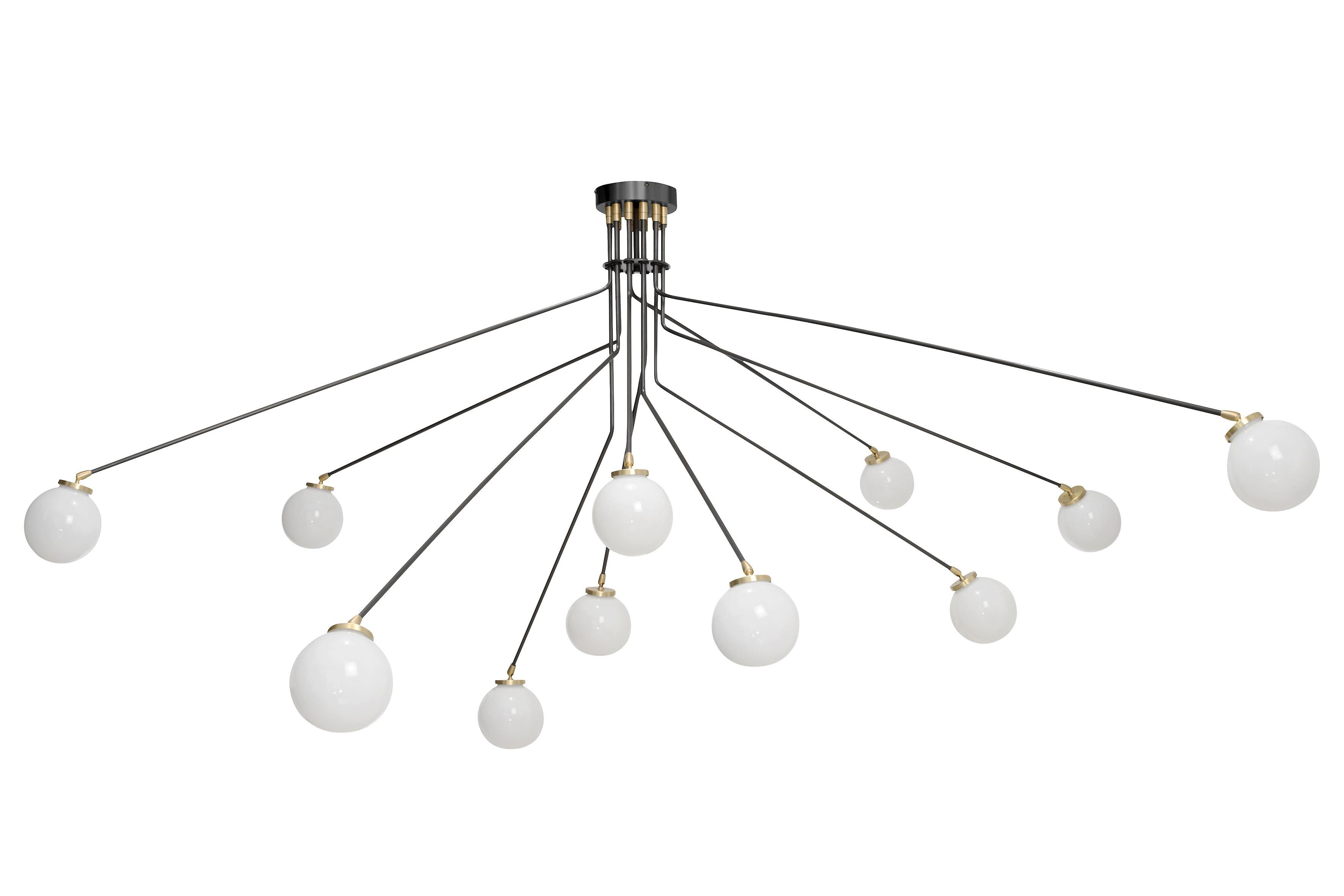 Array large opal pendant Light by CTO Lighting
Materials: bronze with satin brass details and opal glass shades
Dimensions: H 105 x W 260 cm

All our lamps can be wired according to each country. If sold to the USA it will be wired for the USA