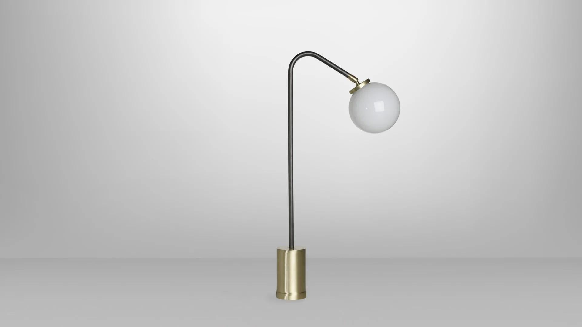 Array opal table lamp by CTO Lighting
Materials: bronze with satin brass base and opal glass shade.
Dimensions: W 12 x D 23 x H 60 cm 

All our lamps can be wired according to each country. If sold to the USA it will be wired for the USA for