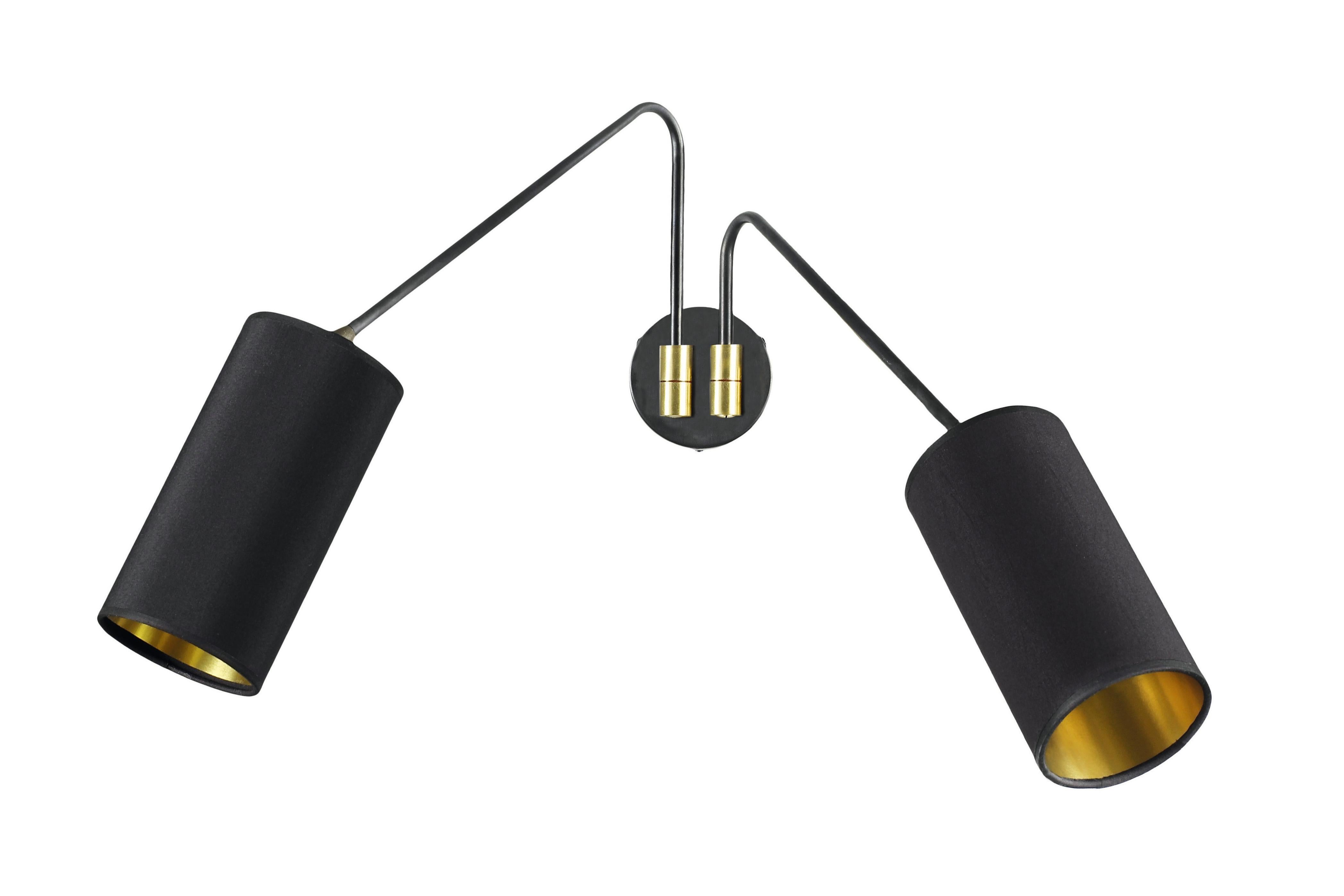 Array twin cotton wall light by CTO Lighting
Materials: Bronze with satin brass details, Black cotton shades/gold lining
Dimensions: 90 x 40 cm

All our lamps can be wired according to each country. If sold to the USA it will be wired for the