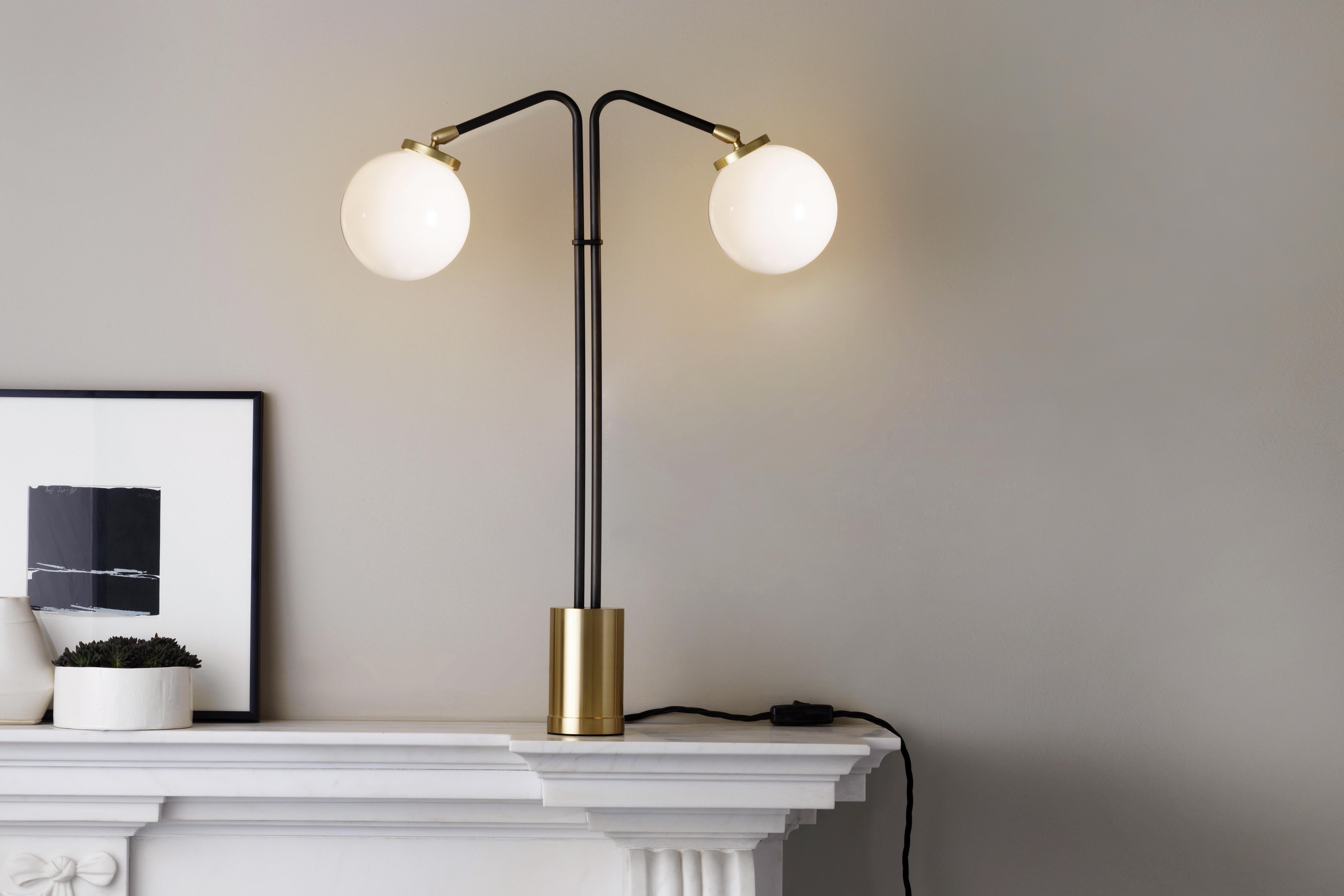 Array twin opal table lamp by CTO lighting
Materials: bronze with satin brass base and opal glass shade.
Dimensions: W 41 x D 12 x H 60 cm 

All our lamps can be wired according to each country. If sold to the USA it will be wired for the USA for
