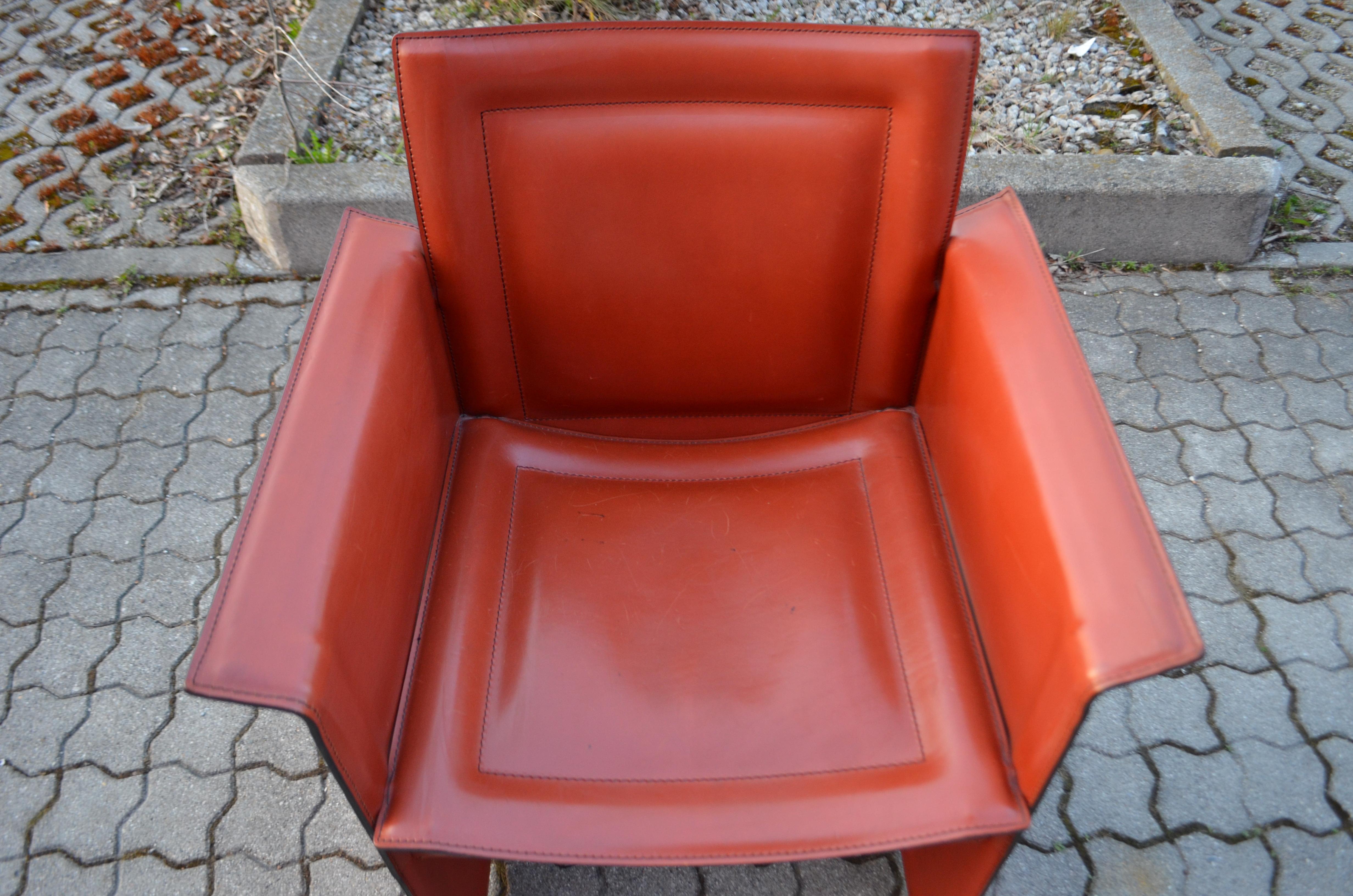 This comfortable armchair is manufactured from the 1980s by Arrben in Italy and the Model is Solaria.
Thick china red saddle leather.
It can be used as dining chair or also at the desk.
Perfect leather quality.
 
