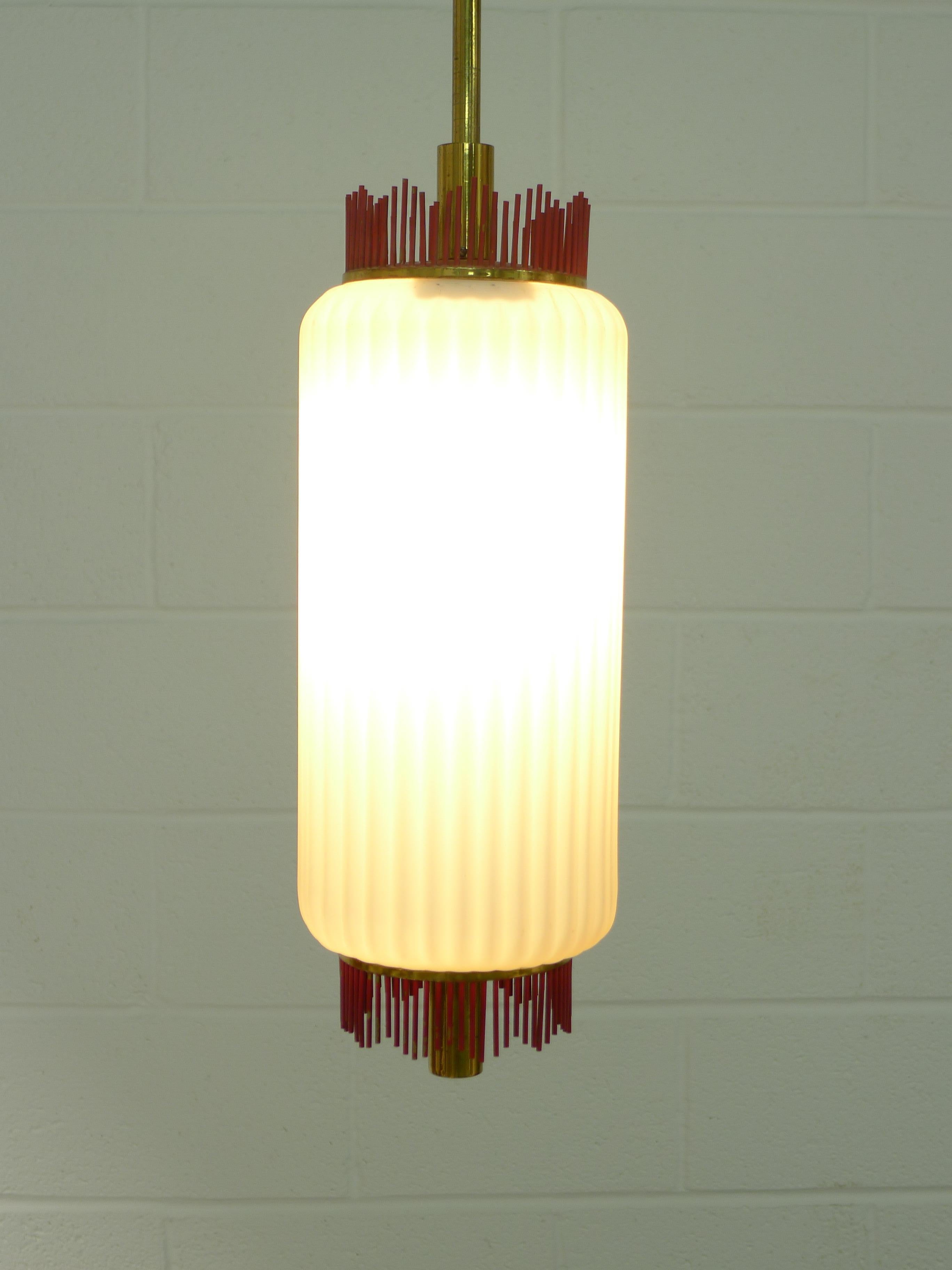 Angello Lelli for Arredoluce, circa late 1950s early 1960s. Attribution since this lamp is not documented in the recent book but bears all the hallmarks/quality of Arredoluce production and uses the same scalloped glass shade as several known