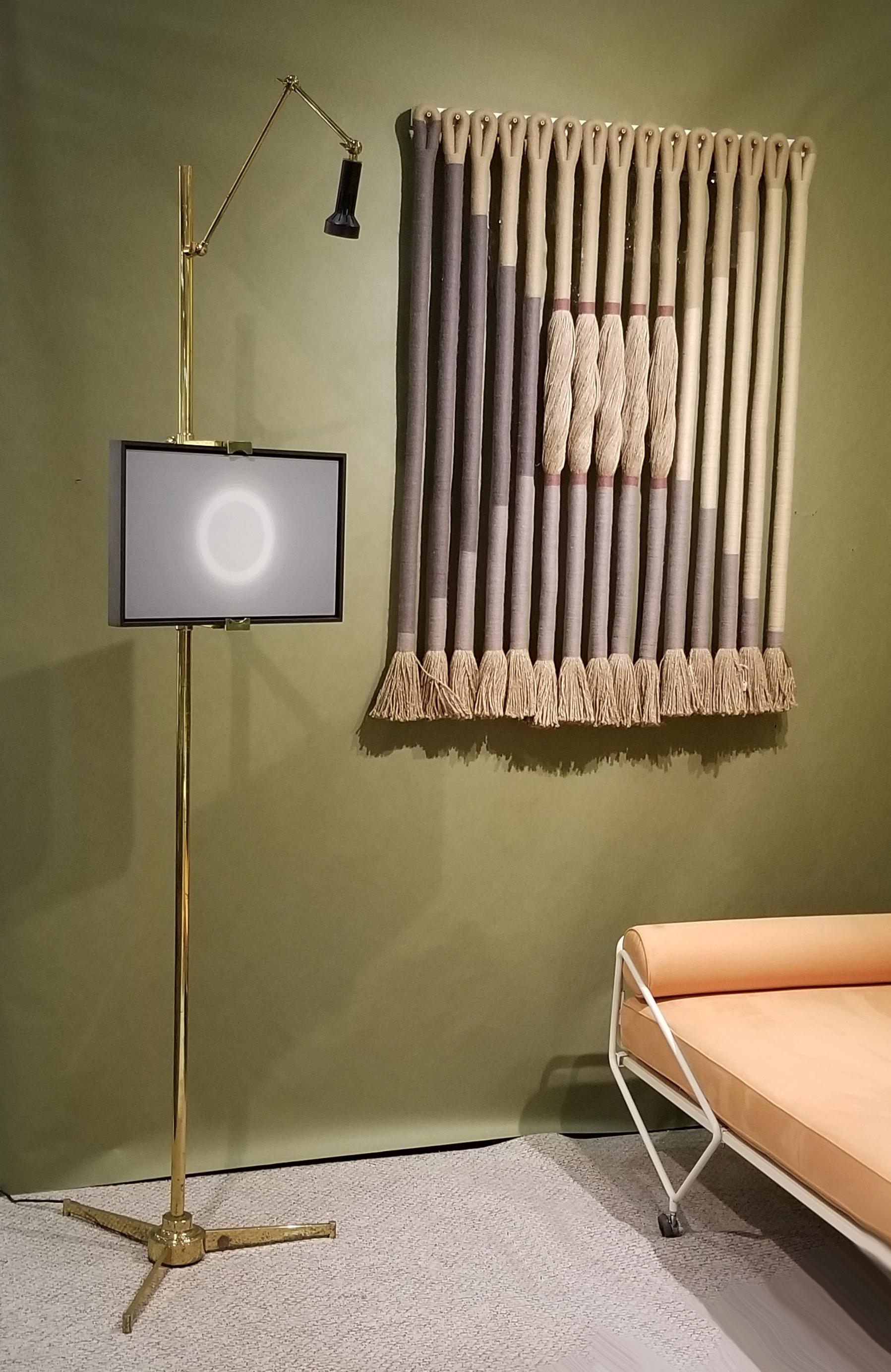 All original example of the Arredoluce Easel lamp. This is the more desirable version with the elegantly tapering tripod base. This example retains the original label to the underside of the fixture and the original foot switch works as intended.