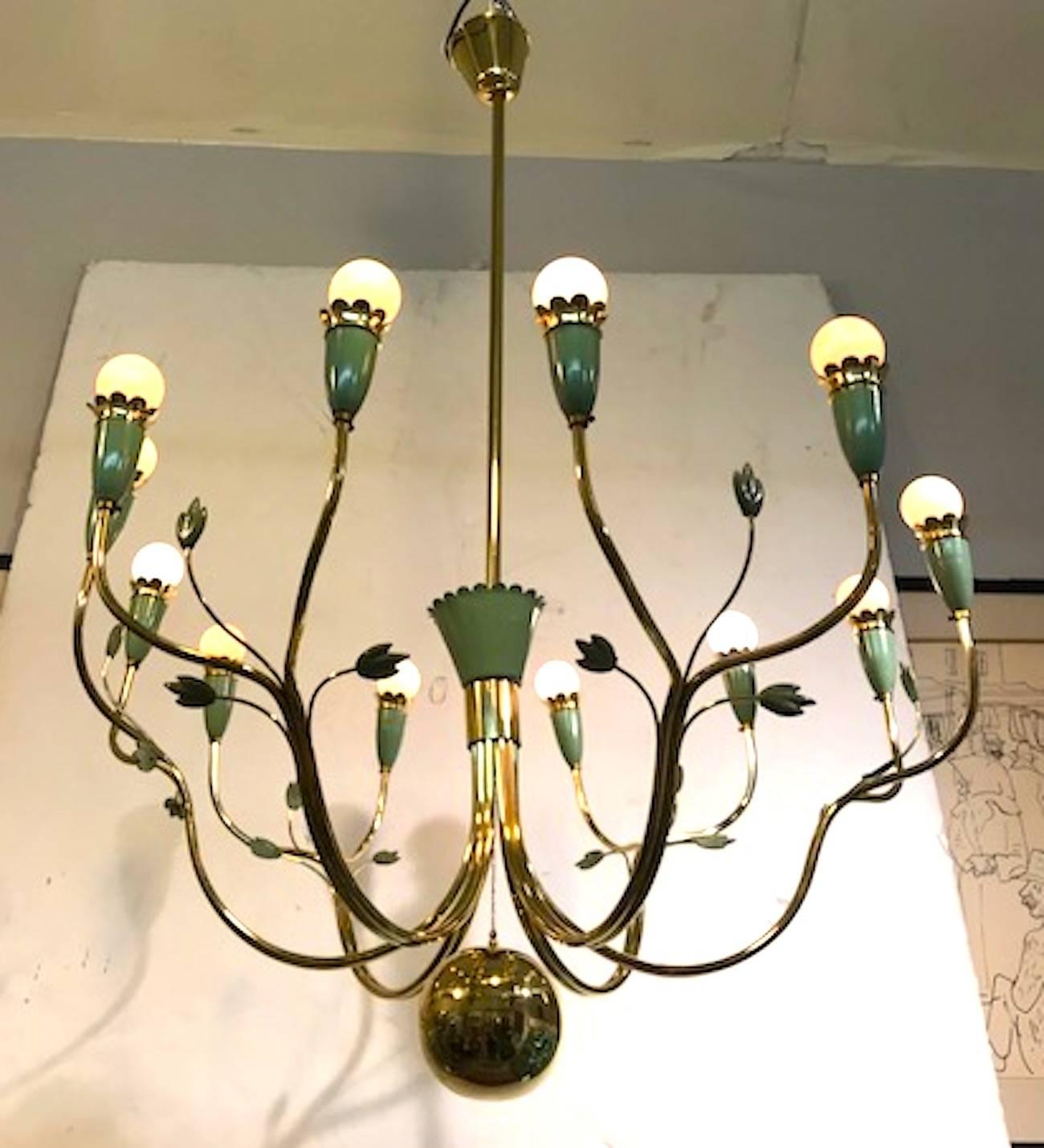 A wonderful and rare large chandelier designed by Angel Lelli and produced by Arredoluce, circa 1950. Lelli founded the lighting company Arredoluce in 1947 in the city of Monza in Lombardy. The body of the chandelier is brass with green enamel leaf
