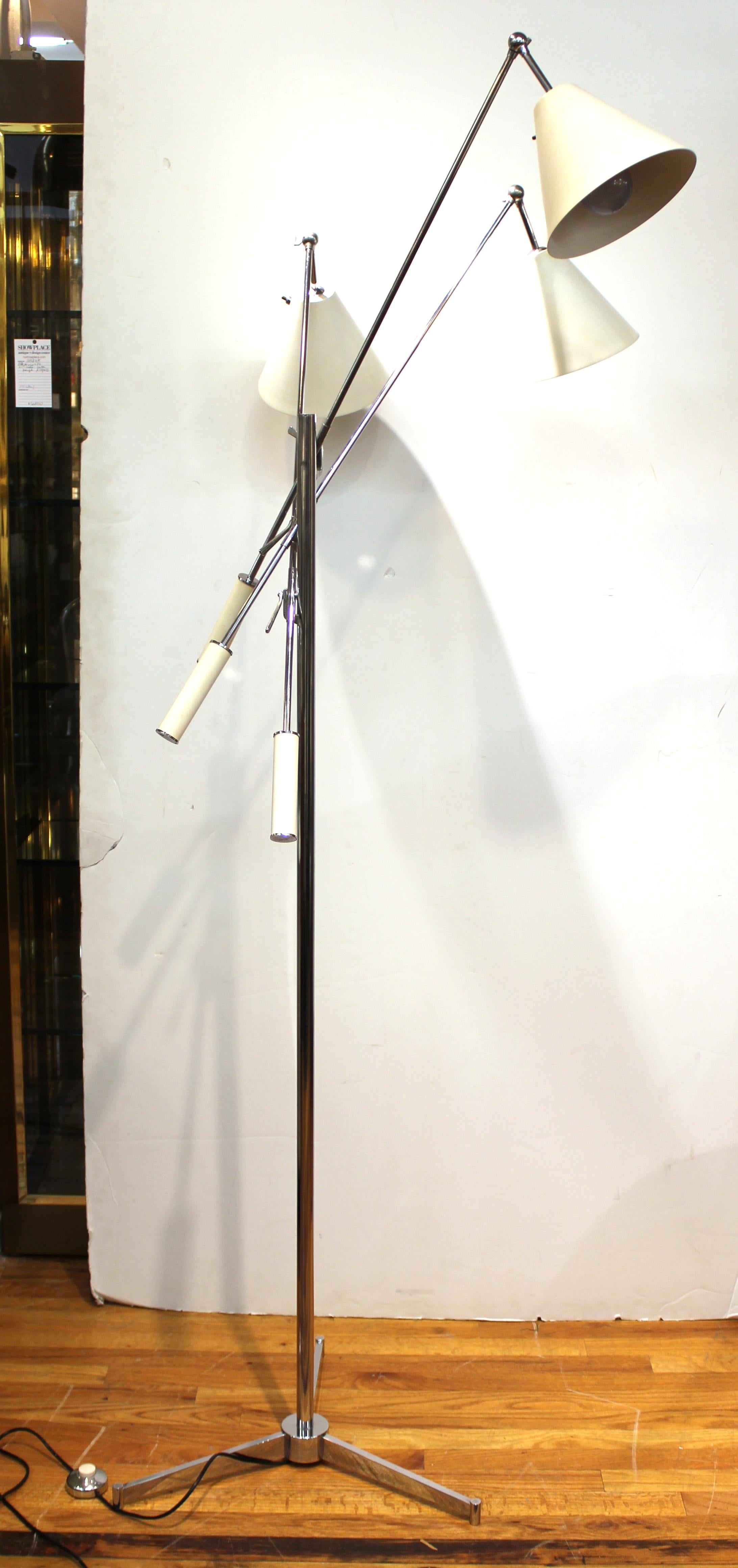 Arredoluce Italian modern Triennale floor lamp designed by Angelo Lelli with three articulated arms. The piece is in great vintage condition and is marked on the bottom.