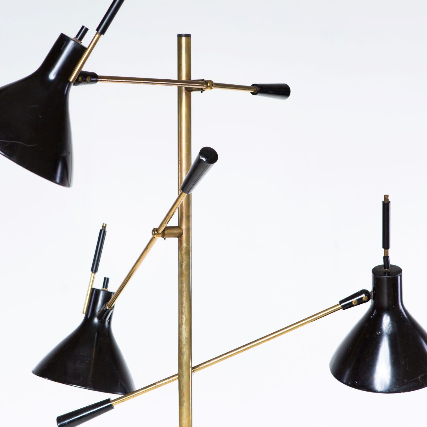 Rare and early Arredoluce Triennale Floor Lamp, Marble base,
original black enameled shades and details, patinated brass. 
Including original labels.

Base Diameter: 10 