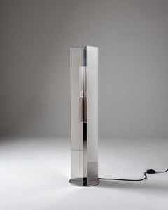 Arrow 120 floor lamp in polished steel by Violaine d'Harcourt