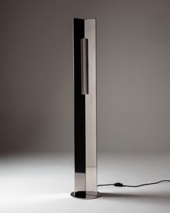 Arrow 158 floor lamp in polished steel by Violaine d'Harcourt