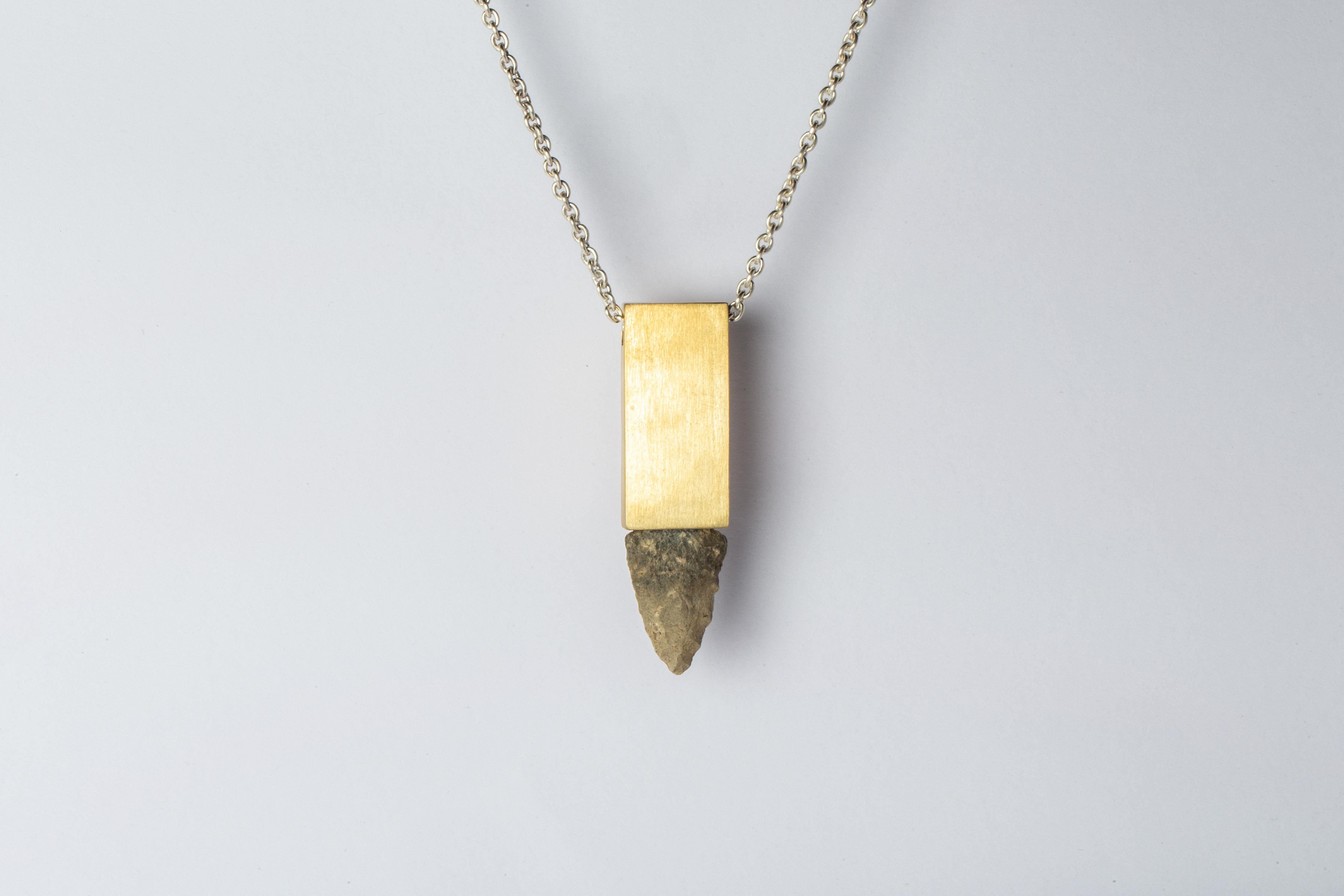 Necklace in the shape of cuboid made in matte brass, matte sterling silver, and arrowhead. The arrowhead was found in Massachusetts with possible tribe relationship to: Mohawk, Mahegan, Pocumtuc, Nipmuc, Pequot, Wampanoag or Norwottuck.

These