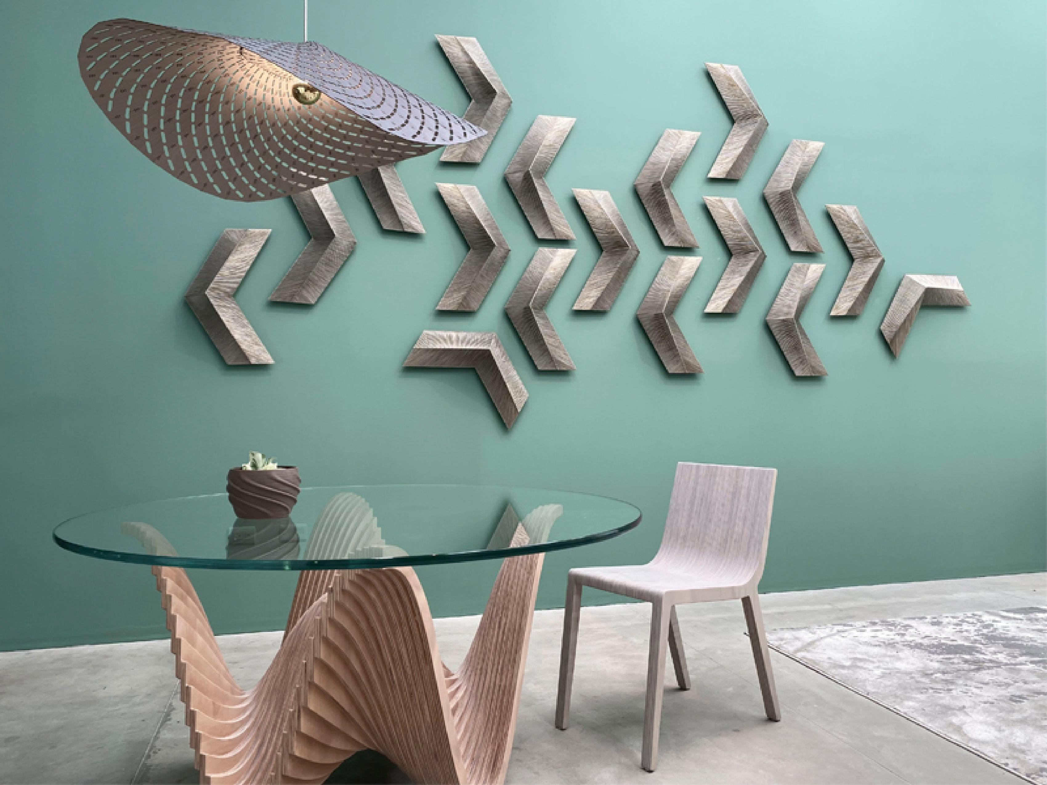 This captivating wall decor piece, titled Arrows, is a bold and stylish addition to any modern interior. Crafted from a refined mix of silk, cotton, synthetic threads, and PVC, it combines natural elegance with contemporary durability to create a