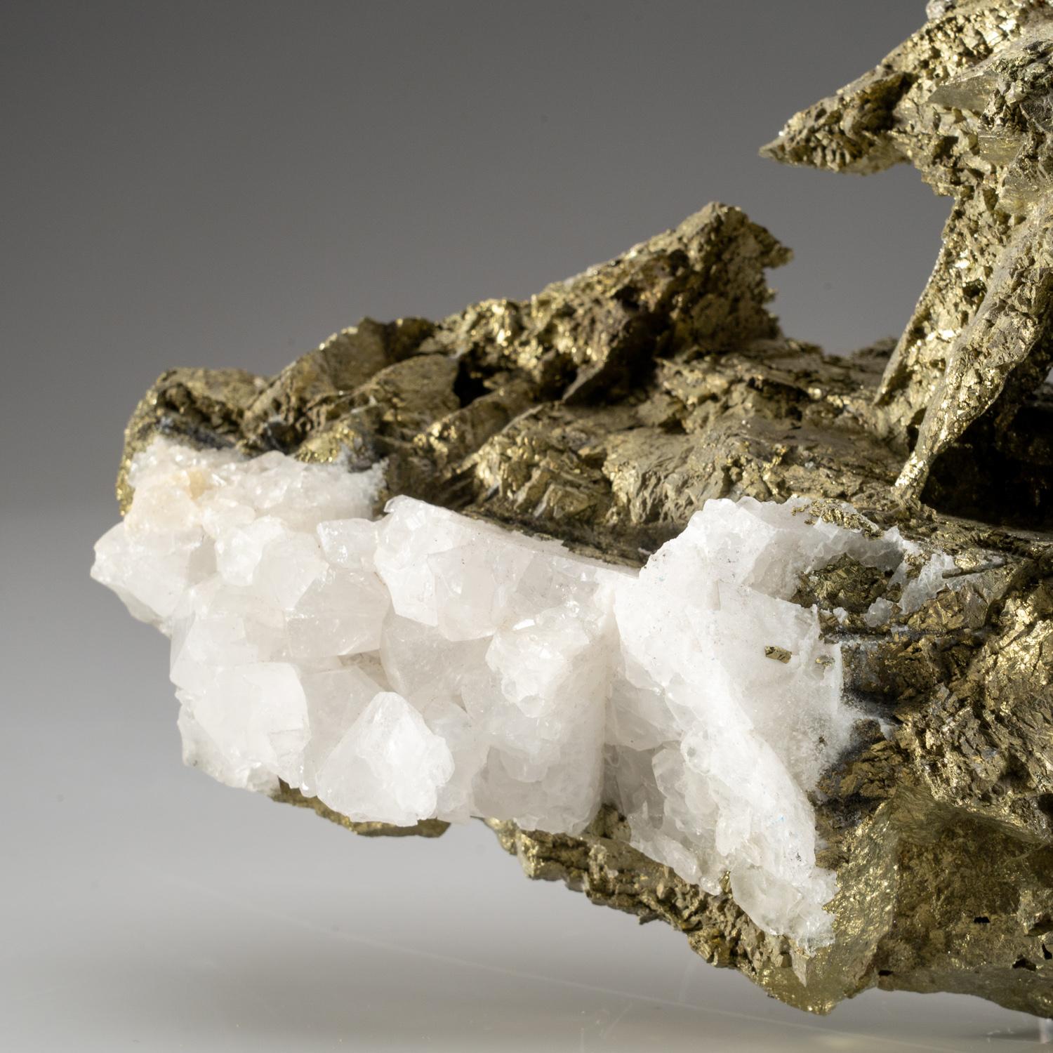 From Deveti Septemvri Mine, Madan District, Rhodope Mountains, Bulgariaina

Rare large specimen of crystals of arsenopyrite with quartz. The arsenopyrite crystals are in complex aggregates of parallel crystals.

 

Weight: 4.5 lbs, Dimension: 10 x 2