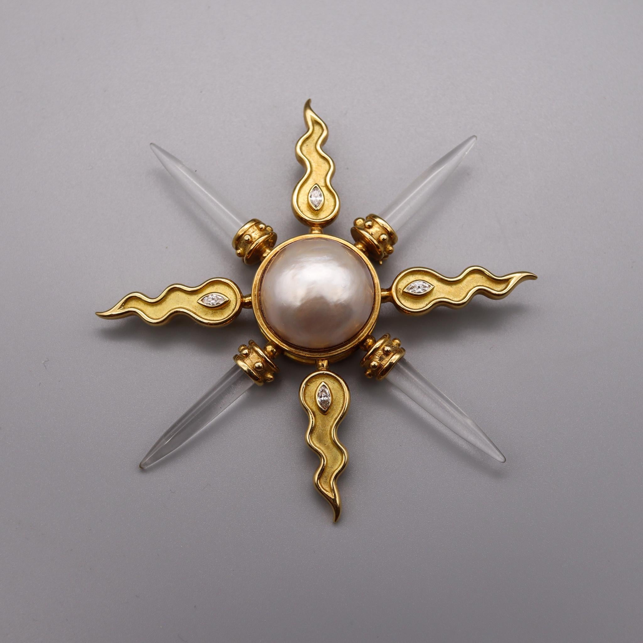 Exceptional modernist spikes pendant-brooch.

A contemporary statement piece crafted in the shape of a Maltese cross in solid 18 karats of textured yellow gold. Is suited at the reverse with a horizontal hinged pin bar, with a lock. This can be used