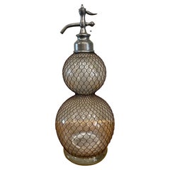 Bouteille de syphon Soda Art Nouveau Seltzogene, verre blanc avec veste en fil de fer