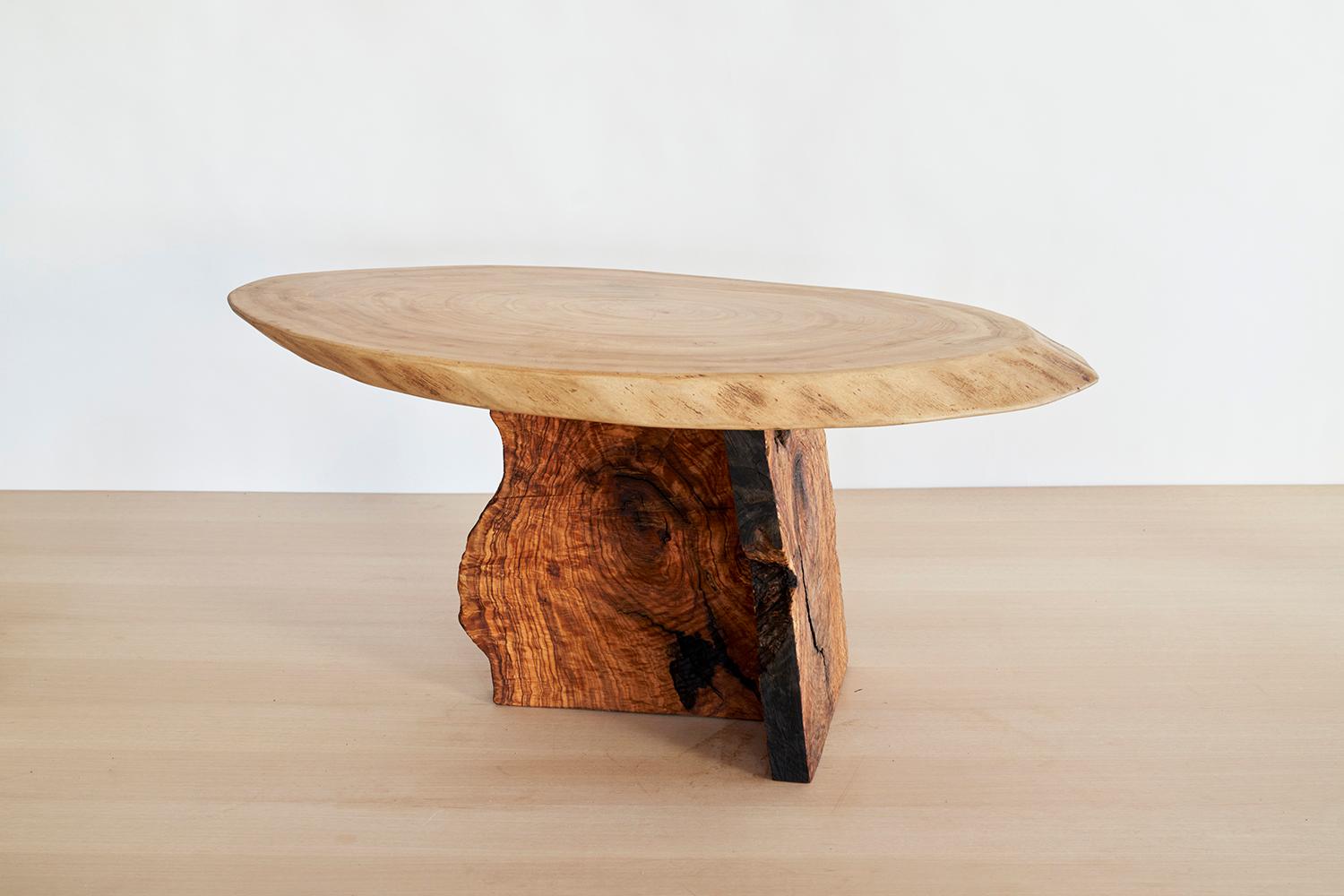 Art Brut Center Table by Jean-Baptiste Van Den Heede
Unique piece
Dimensions: W 45 x D 90 x H 43 cm
Materials: Natural Olive Wood on Elm Wood.

Living room table from the ART BRUT collection. A functional sculpture that can be seen as a side table
