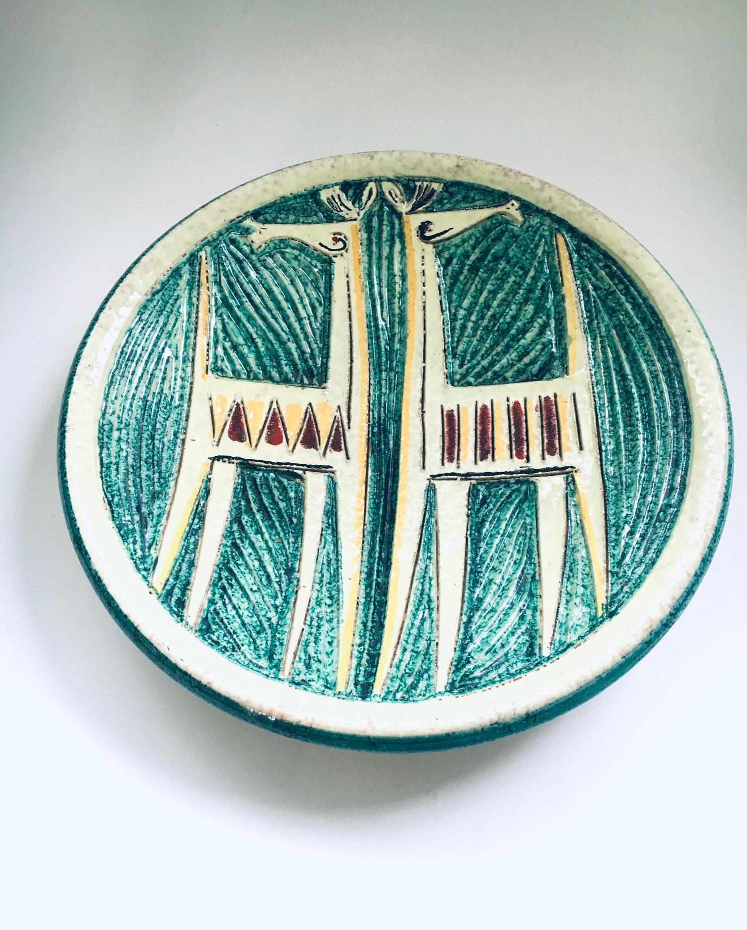 Vintage Midcentury Art Ceramic Studio Stoneware Etruscan Horses Bowl or wall plate by Fratelli Fanciullacci. Made in Italy, 1960's period. Signed Italy 63/74 on the bottom. Beautiful pale yellow and green glazes with red, yellow and black details.
