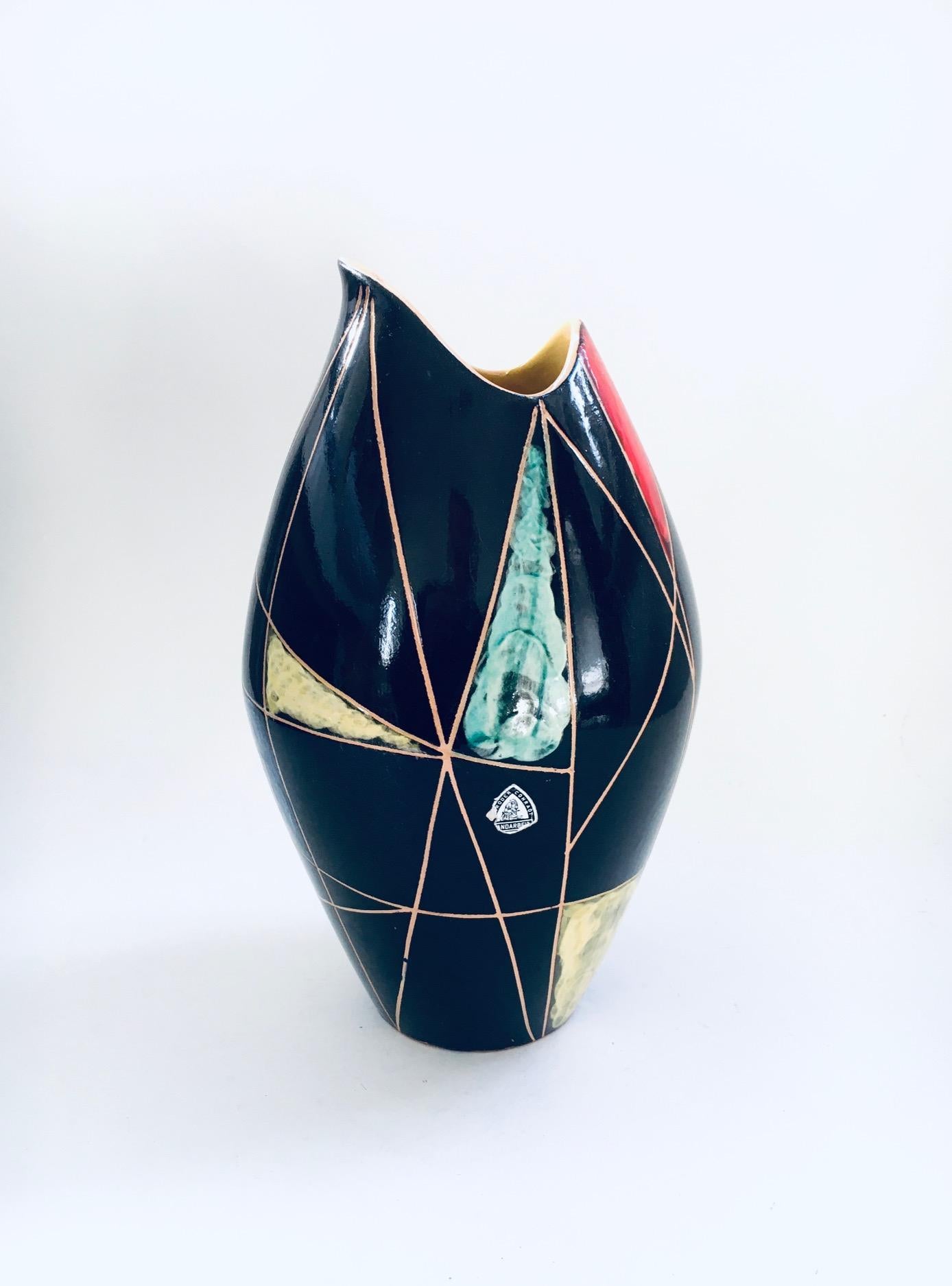 Vintage Midcentury Modern Art Ceramics KRETA 41815 model Vase. Made in West Germany by Gebruder Conradt, 1960's. Hand made Art Vase with typical Atomic Age colors and geometrical shapes. Fish mouth model vase. Comes in very good, all original