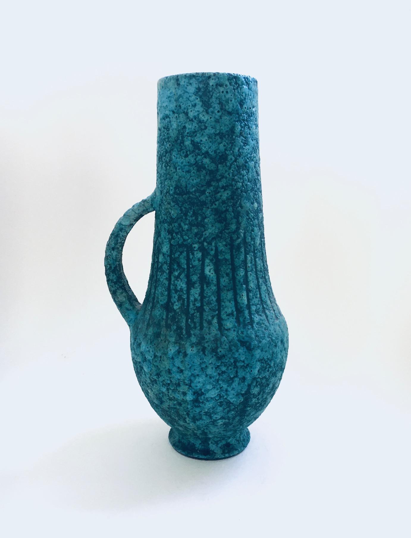 Rare Art Ceramics Sgraffito Handle Vase by Alvino Bagni for Raymor. Made in Italy 1960's period. Turquoise green lava structured  handle vase carafe decanter with stripe carvings. This comes in very good condition. Measures 30,5cm x 16cm x 14cm.