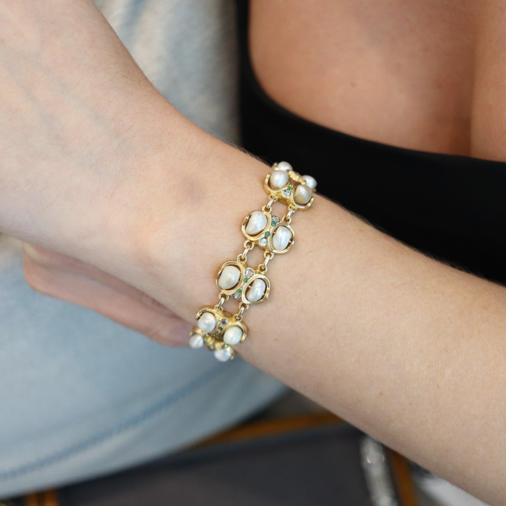Antique bracelet with natural pearls.

This is a beautiful antique bracelet created in America during the turn of the century, back in the 1900. The bracelet has been crafted with mixed styles of  Victorian and art & craft in solid yellow gold of 14