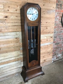 Art & Craft tall case clock by the respected makers W. Greenwood & Sons