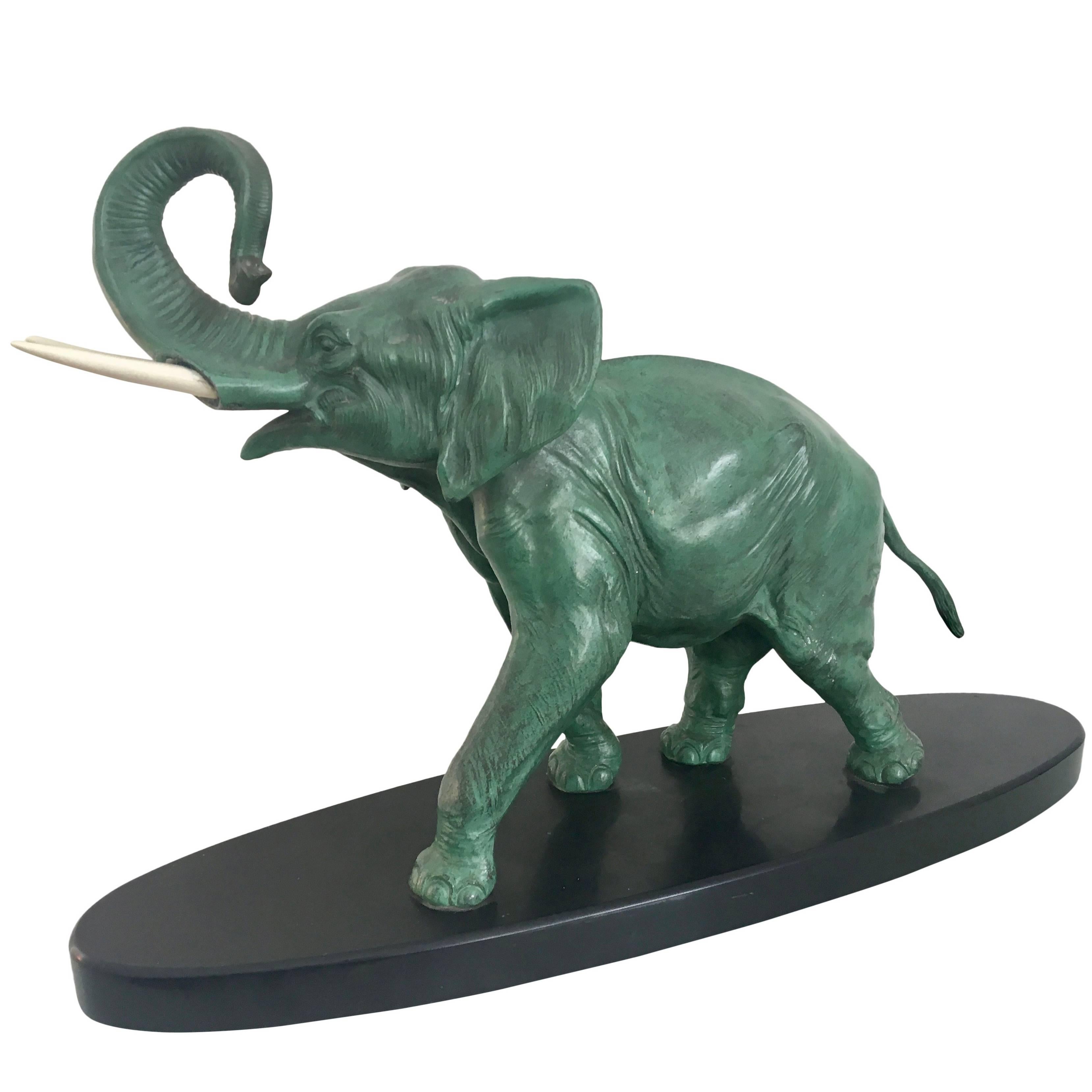 Art Deco Elephant Sculpture in Regule on Black-Marble Socle, France 1930s For Sale