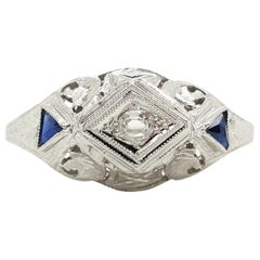 Verlobungsring mit 0,15 Karat Diamant im Ovalschliff und blauem Saphir im Art déco-Stil
