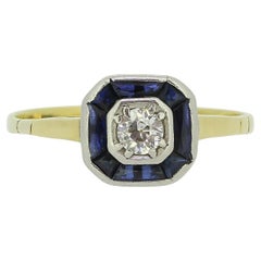 Bague Art déco, diamant taille ancienne de 0,20 carat et saphir