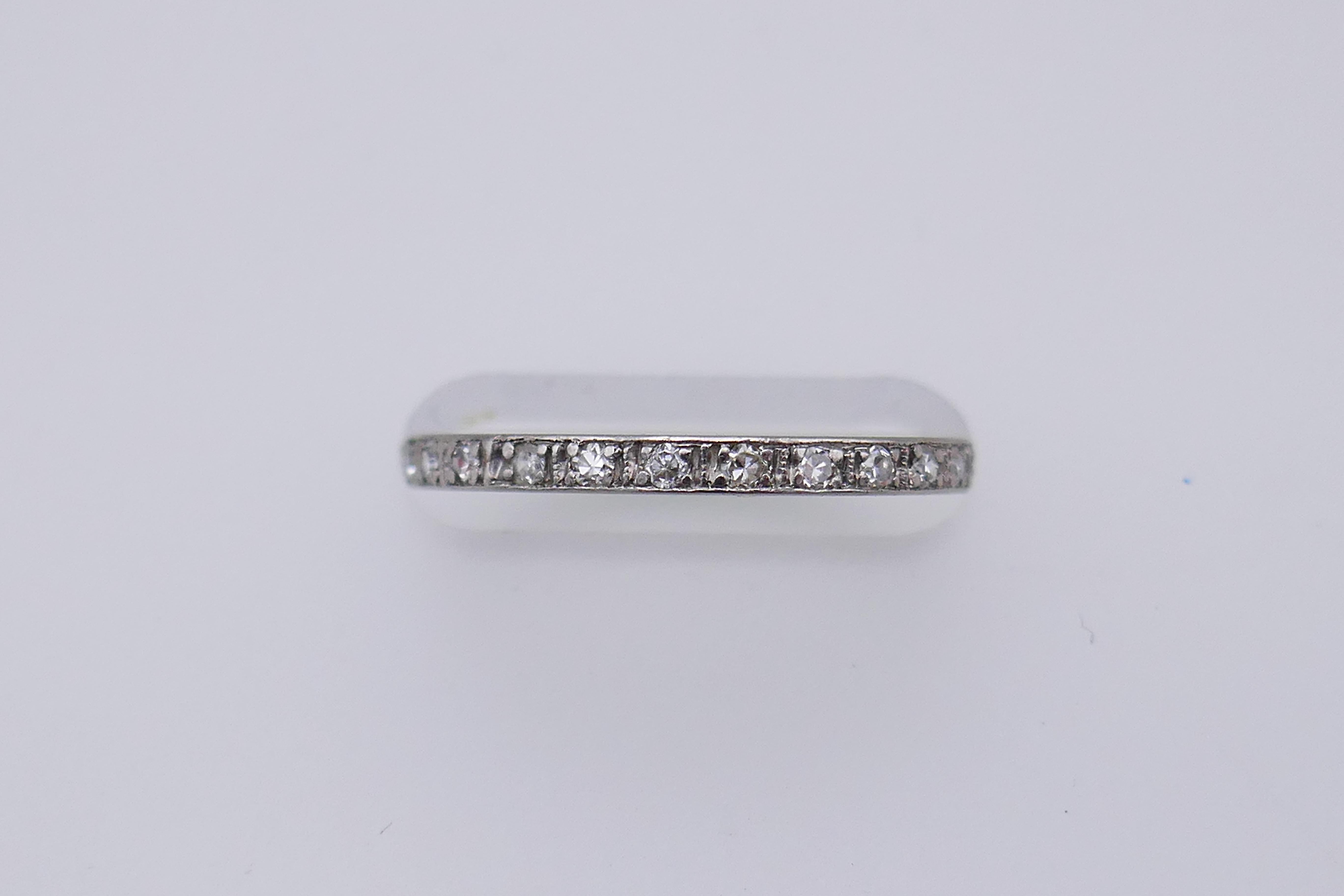 Product details:

The ring features 26 single cut diamonds set in platinum with edging detail on the platinum.

Measurements: the band’s width is 2mm.
Weight: 1.5 grams.
Ring size: 5.5