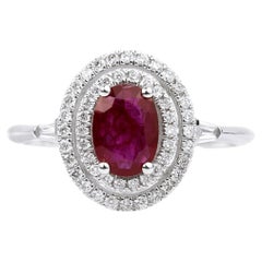 Anello di fidanzamento ovale di rubino rosso con diamante a taglio rotondo Baguette a doppio alone 18k Bianco