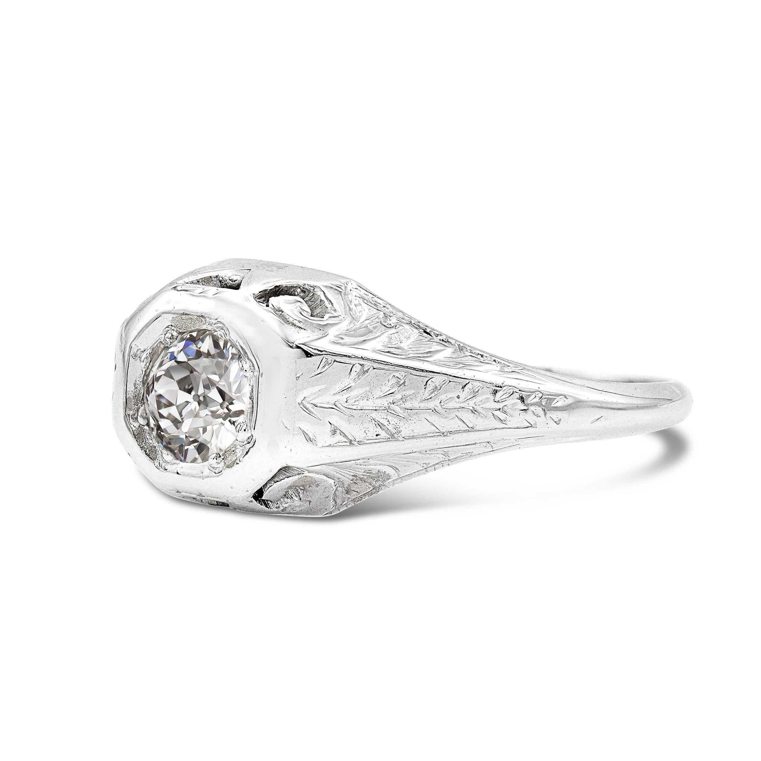We love a solitaire setting with some added intrigue and this art deco engagement ring does not disappoint. The scintillating center shines at all angles and the hand engraved band is the ideal host for an antique diamond.

Diamond Details:
Primary