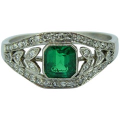 Vintage Art Deco 0.50 Carat Emerald Diamond Ring, circa 1930s, Floral Diamond Surround