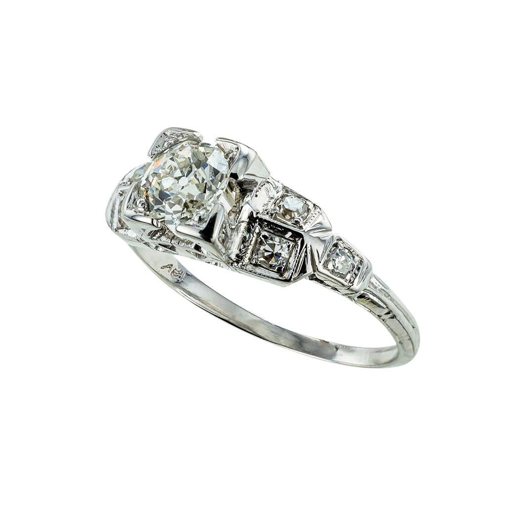 Art Deco 0.50 carat old European-cut diamond and white gold solitaire engagement ring circa 1930. *

ABOUT THIS ITEM:  Scroll down for specifications.  The design is very traditional Art Deco showcasing the main diamond set between a grouping of