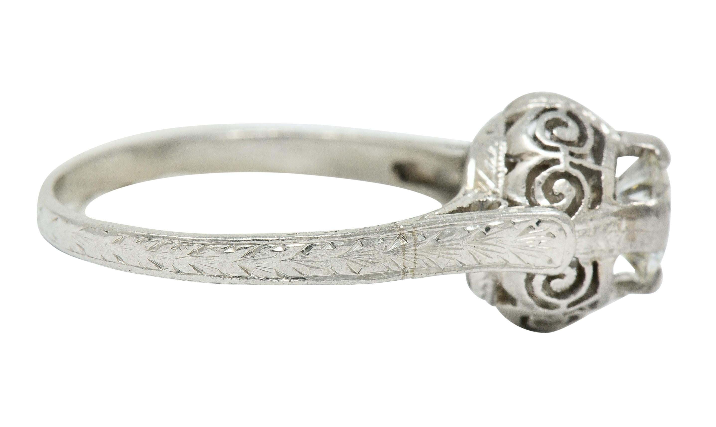 Round Cut Art Deco 0.52 Carat Diamond Platinum Scrolled Foliate Engagement Ring For Sale