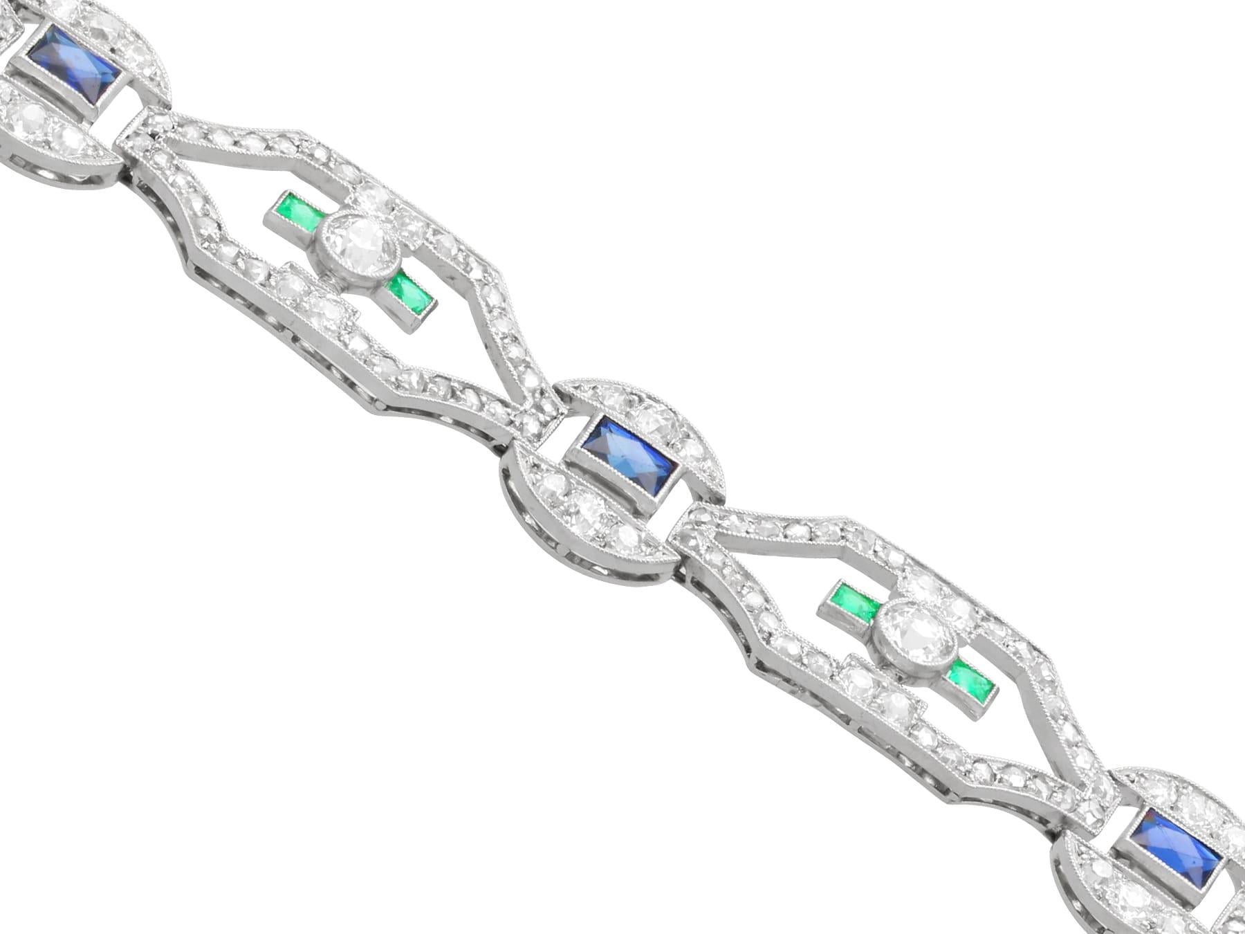 Women's or Men's Art Deco 0.52Ct Emerald, 2.00Ct Sapphire, 4.46Ct Diamond and Platinum Bracelet For Sale