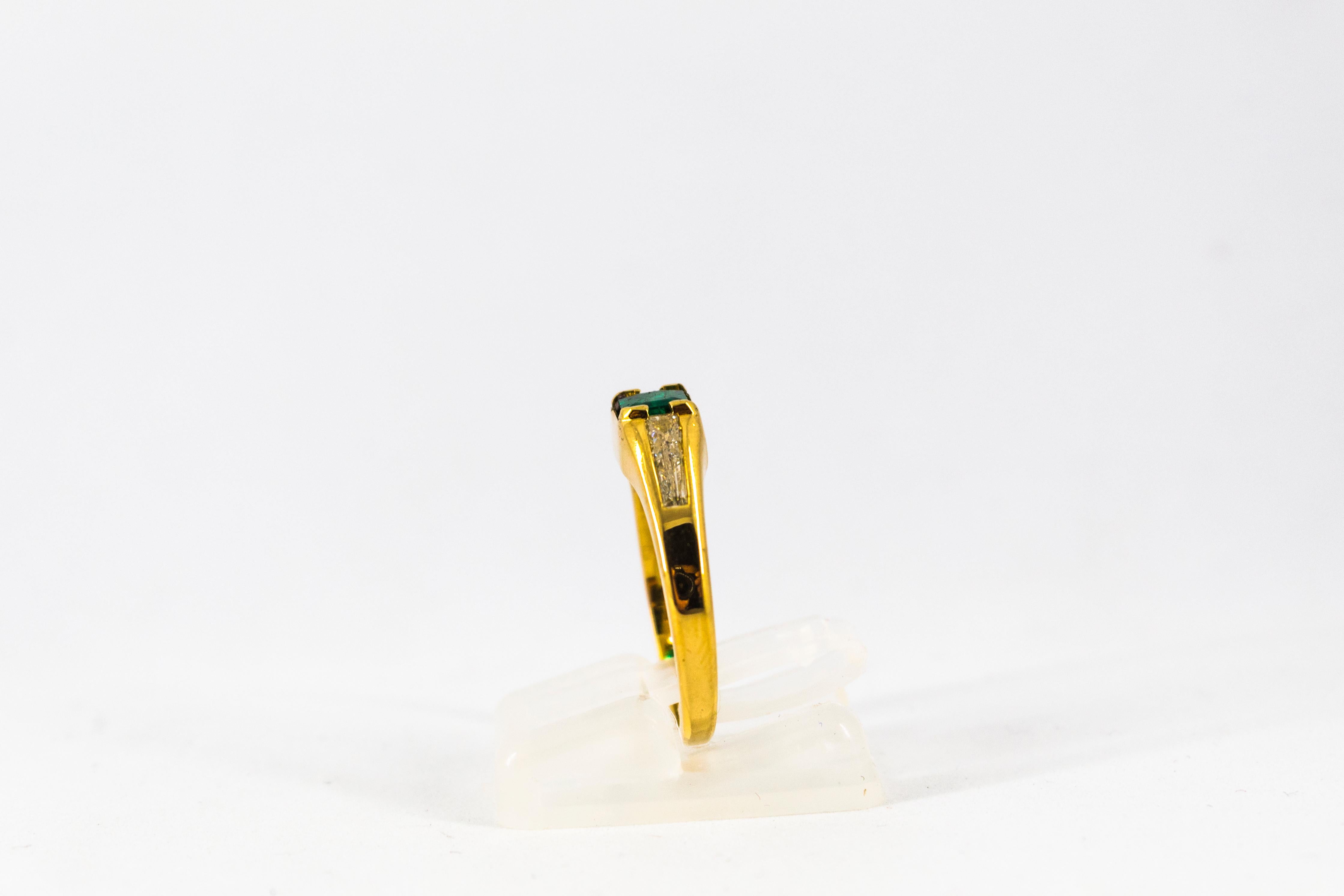 Women's or Men's Art Deco 0.55 Carat Emerald 0.70 Carat White Baguette Diamond Yellow Gold Ring